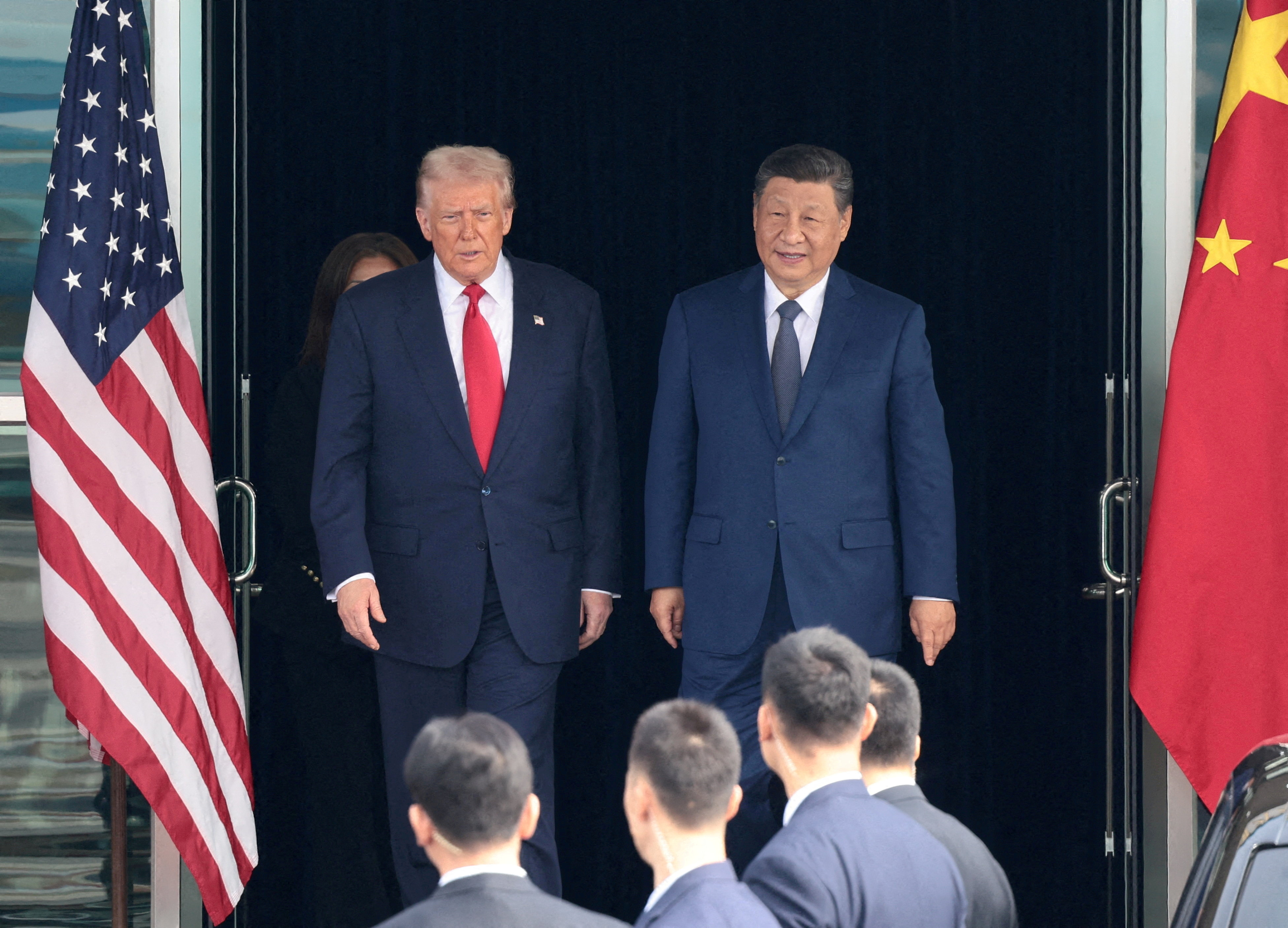 FILE PHOTO: U.S. President Donald Trump meets with Chinese President Xi Jinping on the sidelines of the APEC summit, in Busan