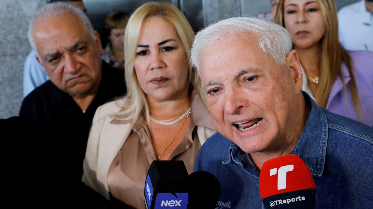 FILE PHOTO: Panama's former President Ricardo Martinelli addresses the media while leaving the National Assembly, in Panama City