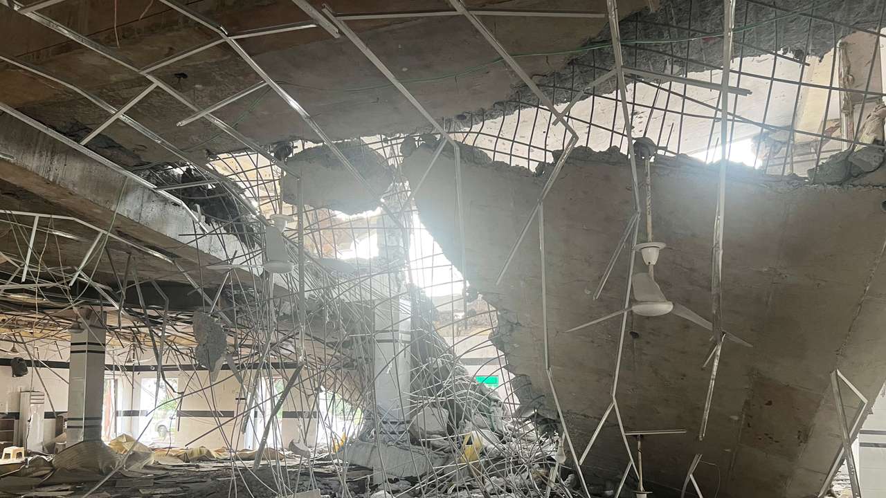 A general view of a damaged portion of a mosque, after it was hit by an Indian strike, in Muridke