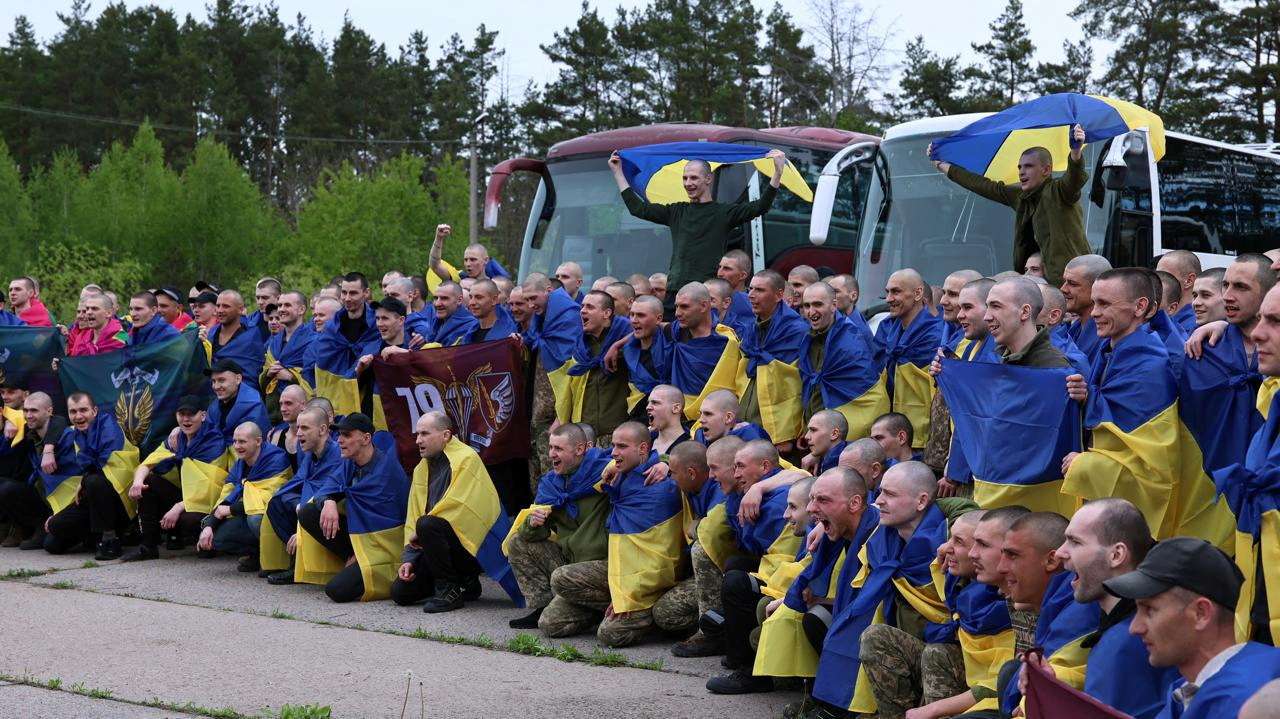 Ukrainian POWs are seen after a swap at an unknown location in Ukraine