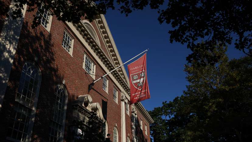 A flag hangs on campus at Harvard University in Cambridge, Massachusetts