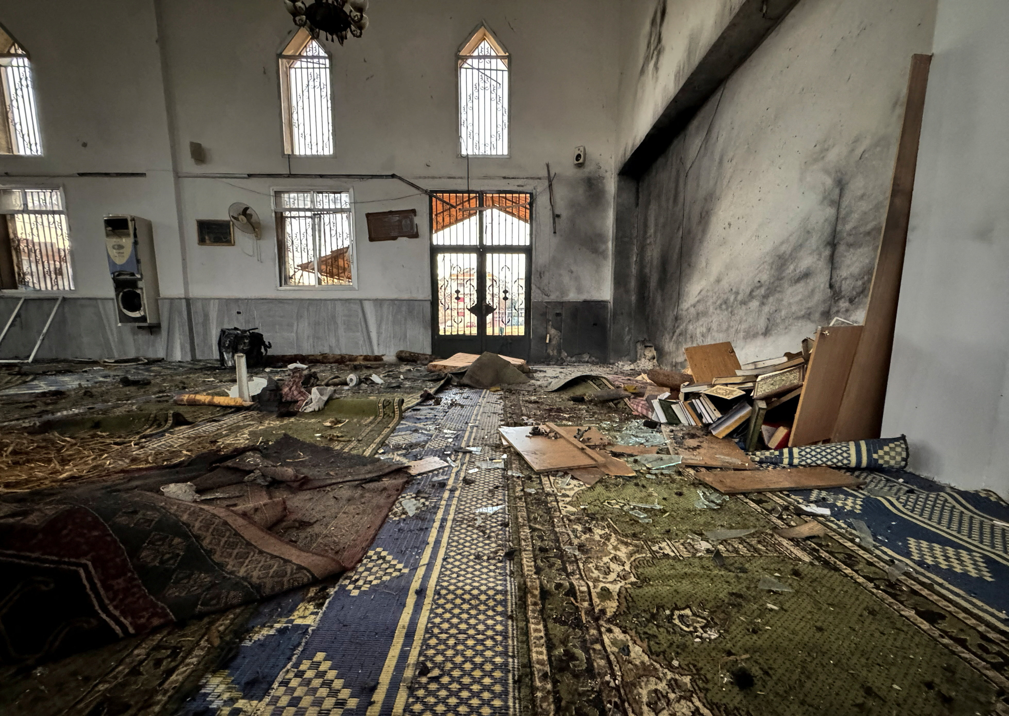 A view shows an interior of a damaged mosque after several people were killed in an explosion at a mosque of the Alawite minority sect in Homs