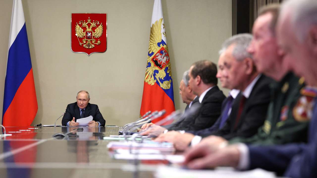 Russian President Vladimir Putin chairs a meeting of members of his Security Council and the government and the heads of law enforcement agencies, outside Moscow