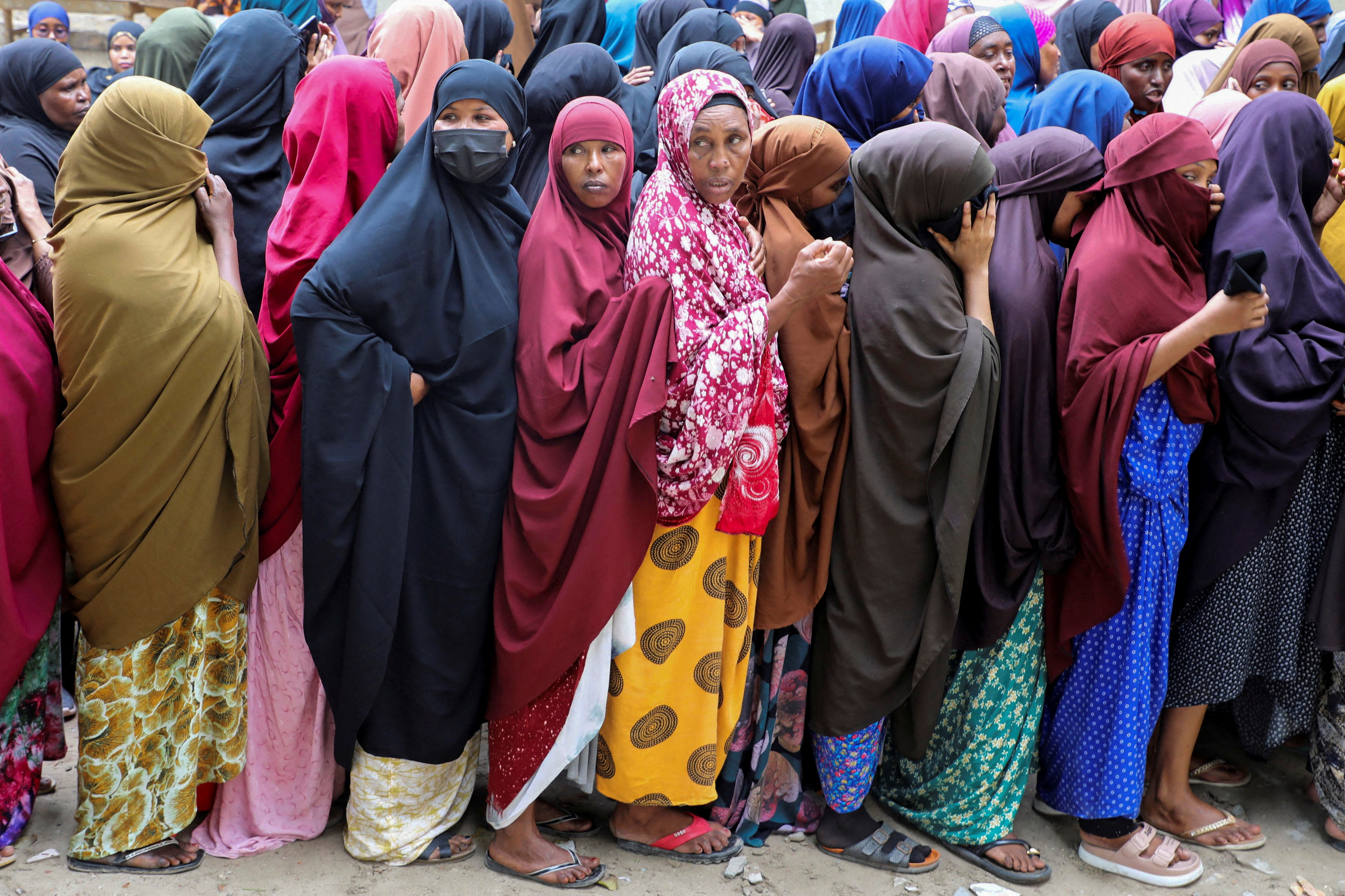 People have their biometrics recorded during voter registration, in Mogadishu