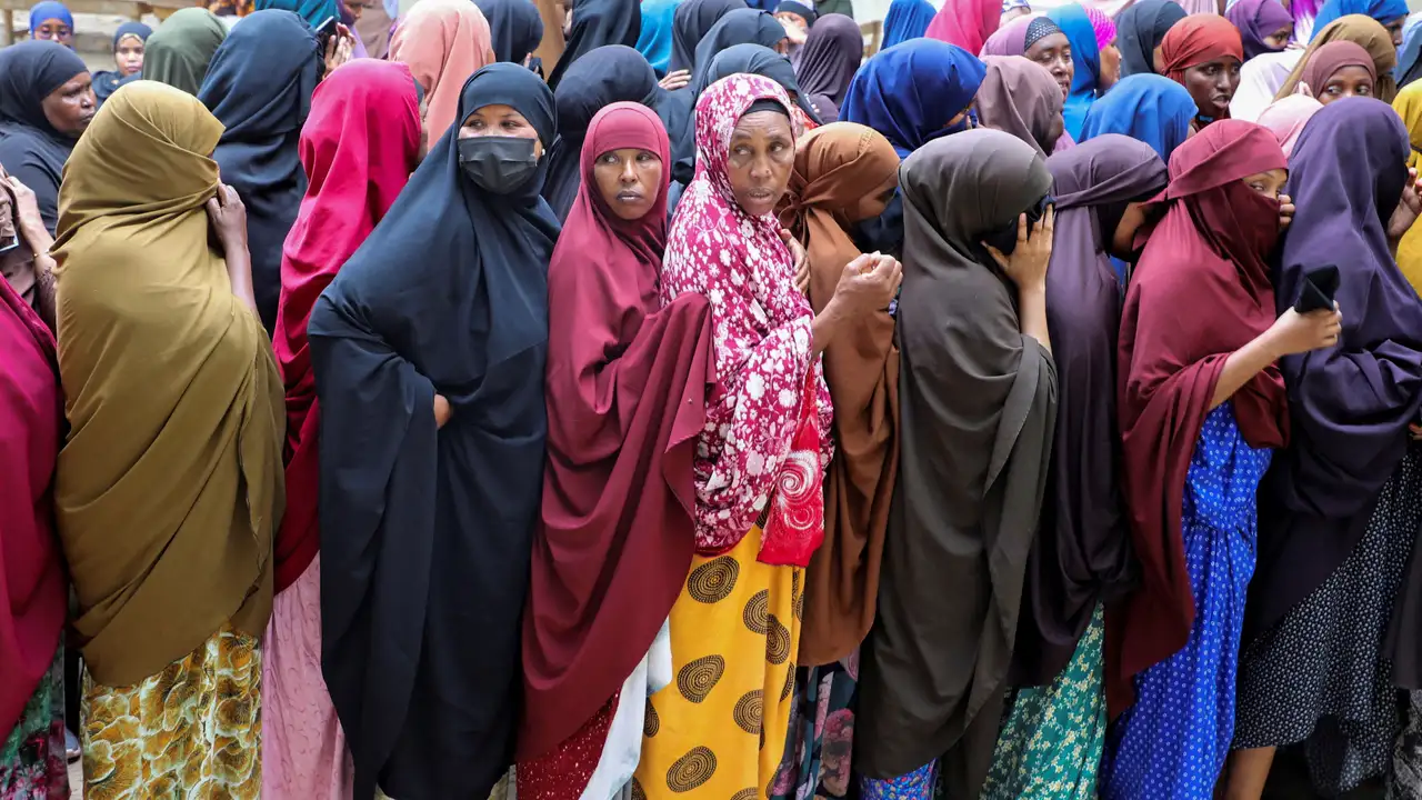 People have their biometrics recorded during voter registration, in Mogadishu