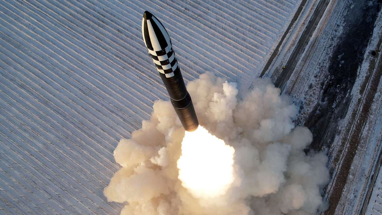 FILE PHOTO: A Hwasong-18 intercontinental ballistic missile is launched during a drill