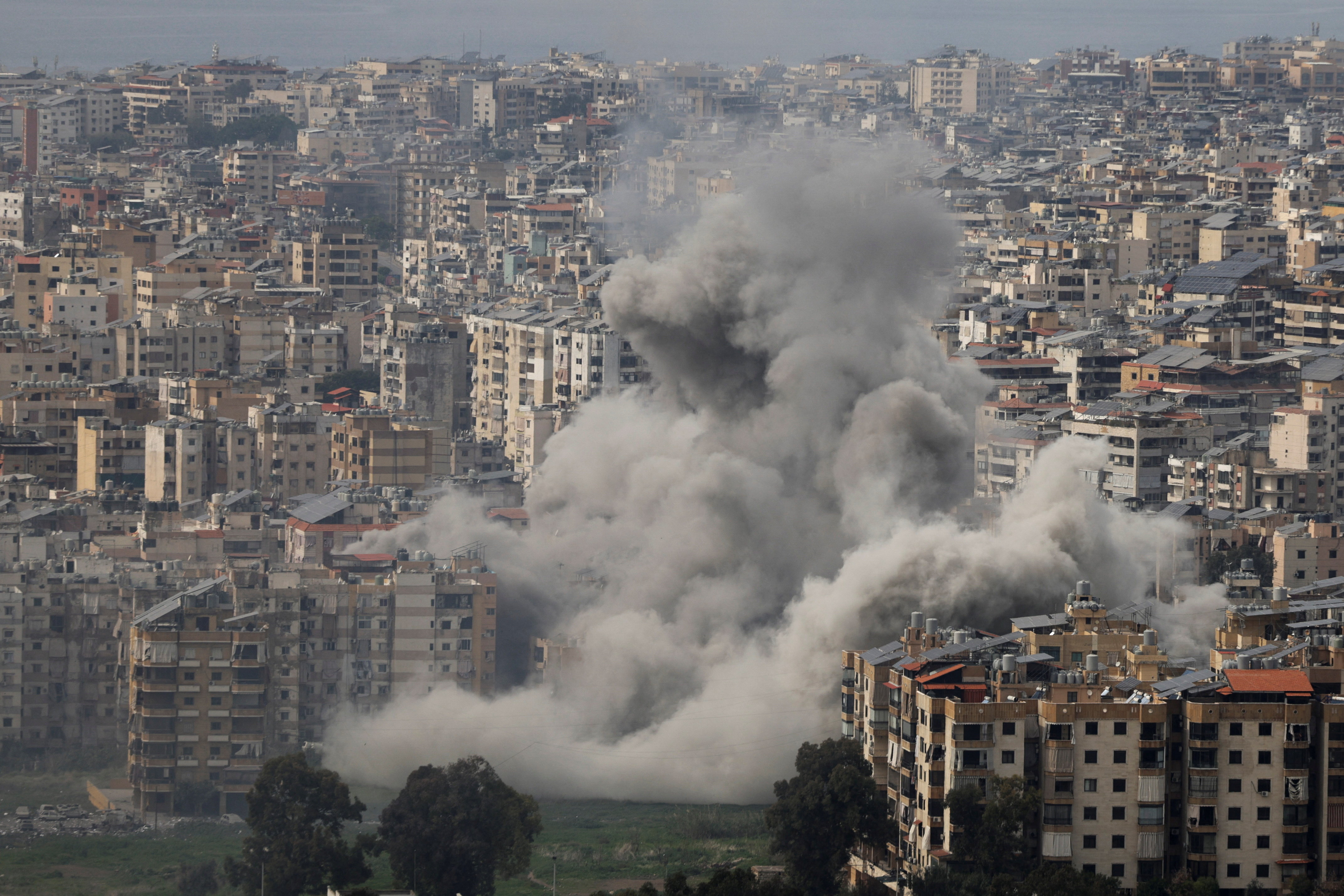 Smoke rises after an Israeli strike on Beirut's southern suburbs