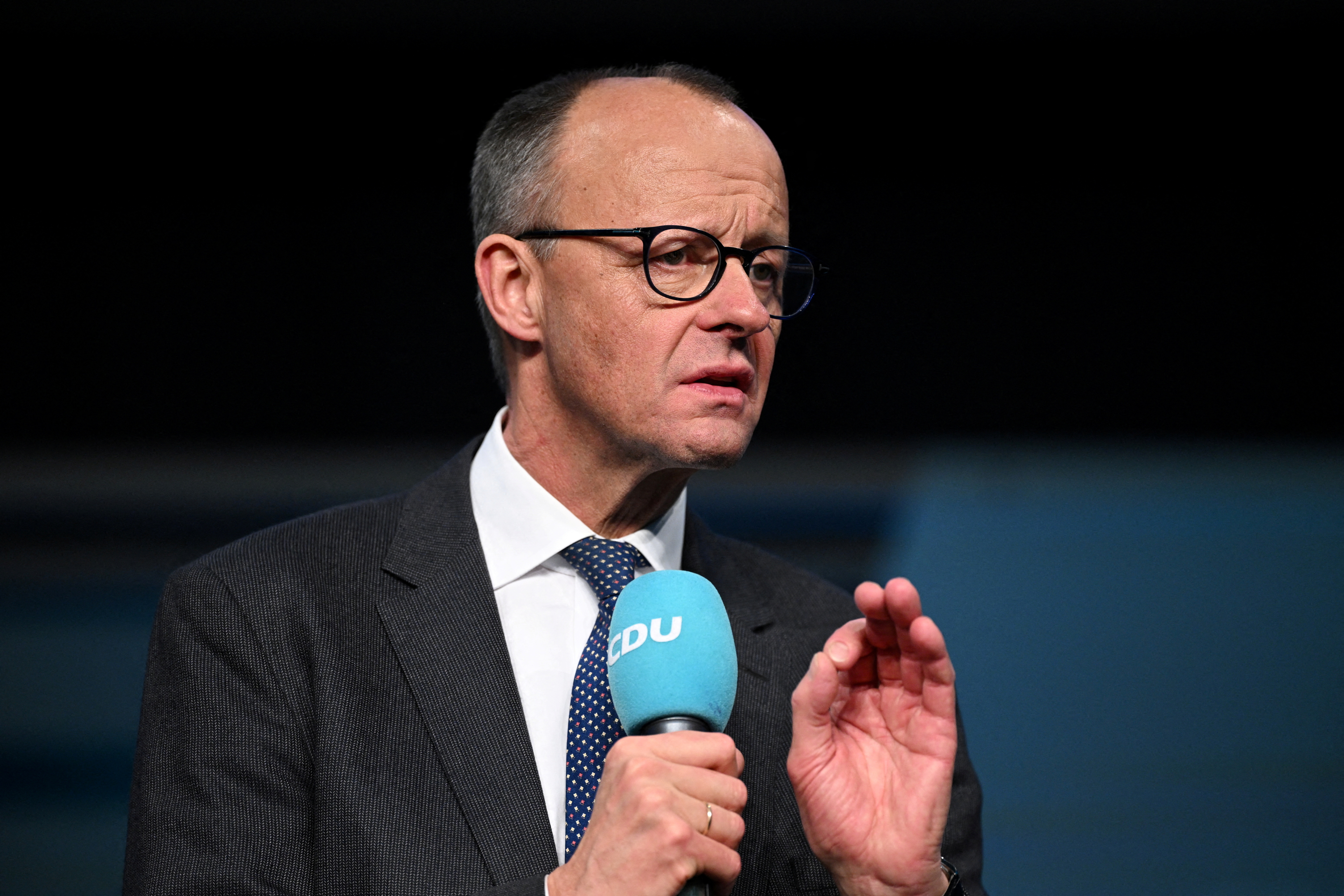 FILE PHOTO: German Conservative CDU candidate for chancellor Merz