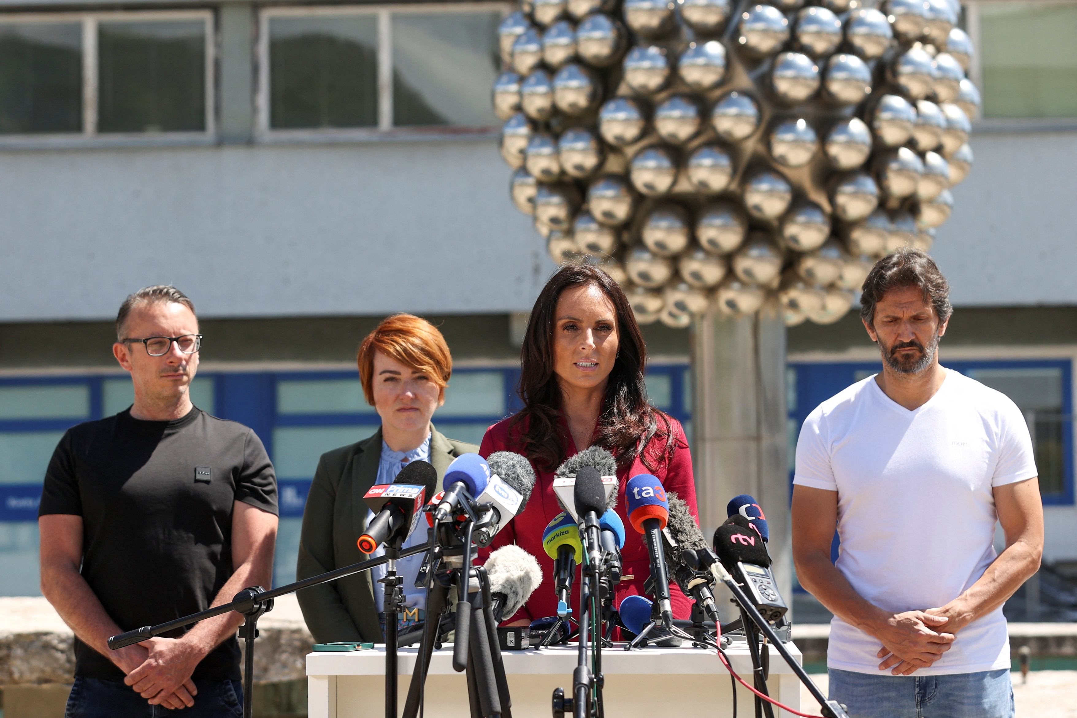 Supporters gather near the F.D. Roosevelt University Hospital, where Slovak PM Fico is hospitalised following an assassination attempt, in Banska Bystrica