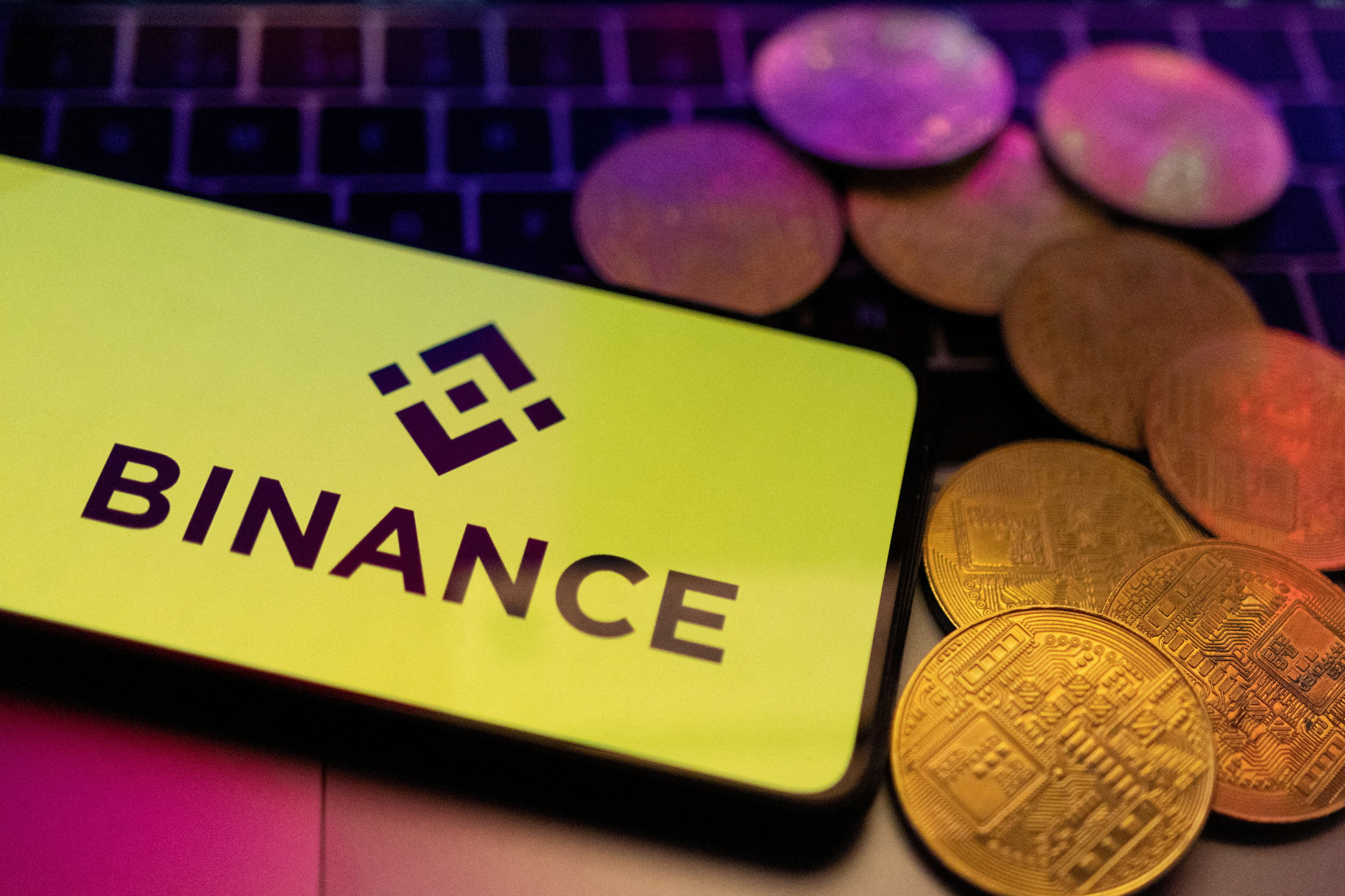 FILE PHOTO: Illustration shows smartphone with displayed Binance logo