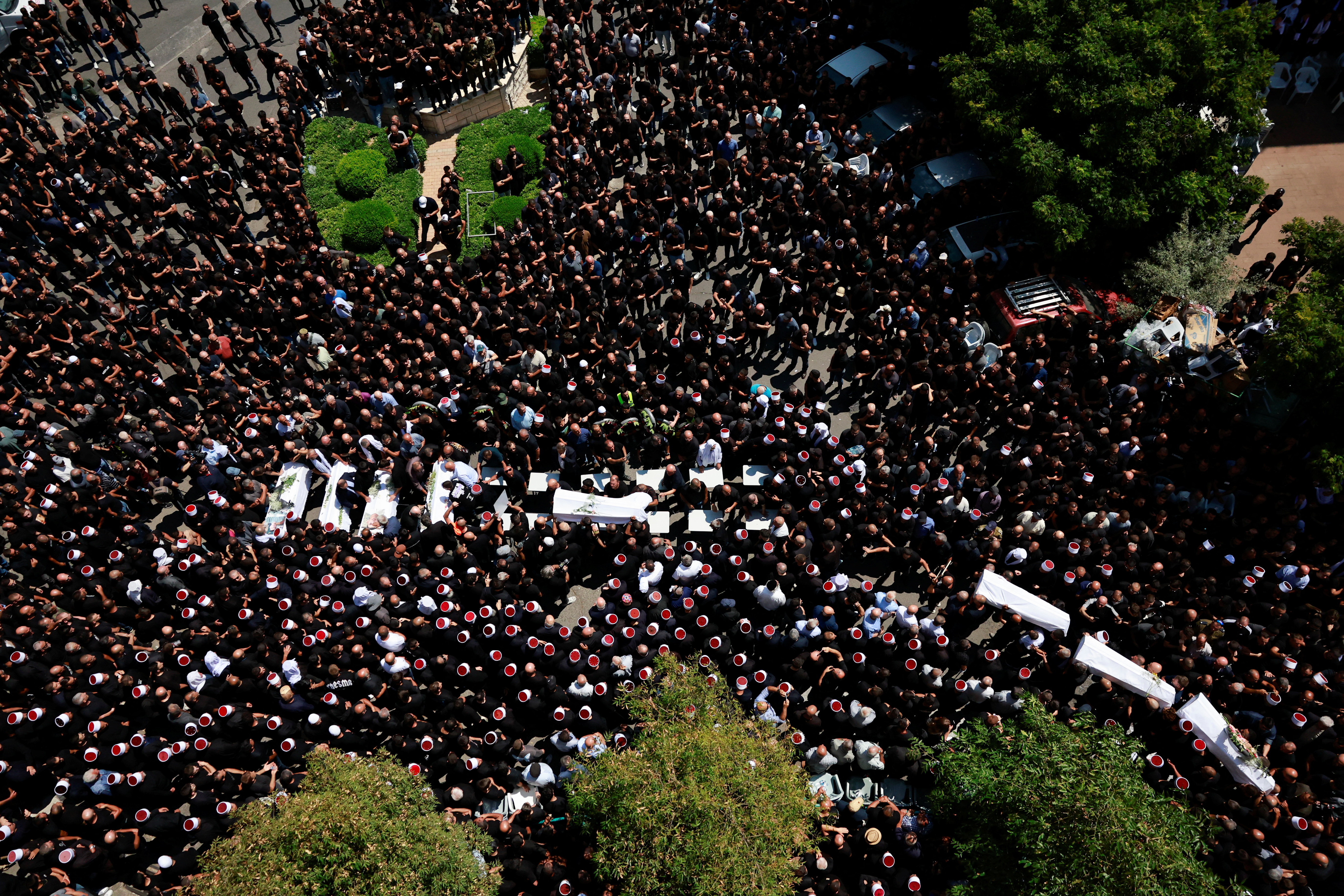 Funeral of children who were killed at a soccer pitch by a rocket fired from Lebanon, in Majdal Shams