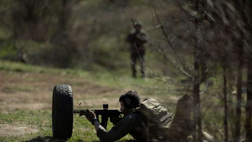 A Ukrainian serviceman of the 58th brigade practices at a shooting range in the Donetsk region