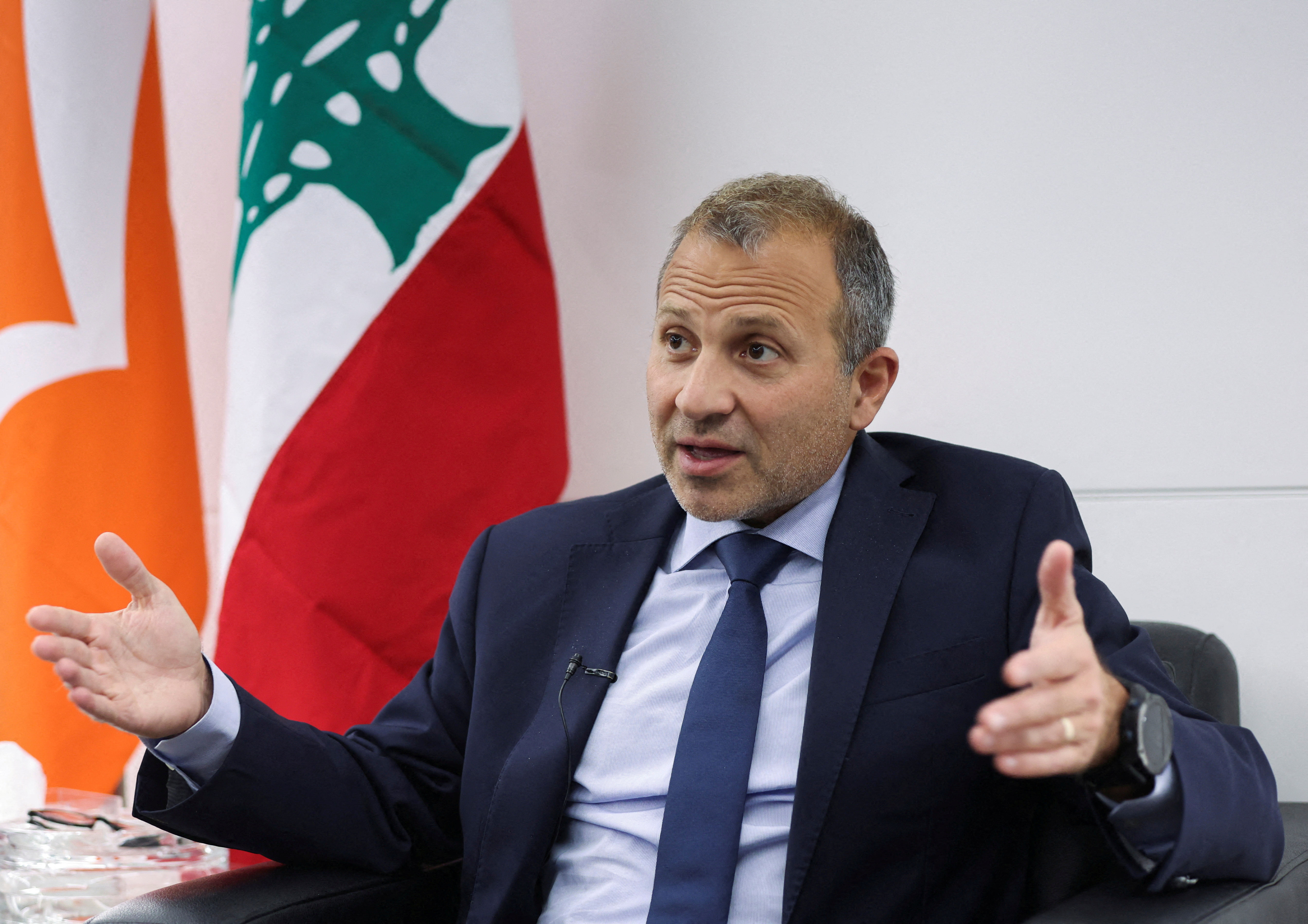 FILE PHOTO: Gebran Bassil, a Christian member of parliament and former minister gestures as he speaks during an interview with Reuters in Sin-el-fil