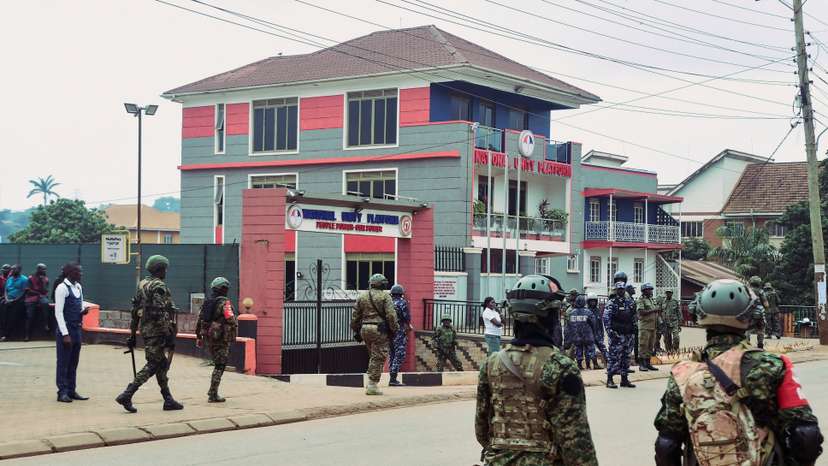 Police and troops block Ugandan opposition NUP's headquarters ahead of protest, in Kampala