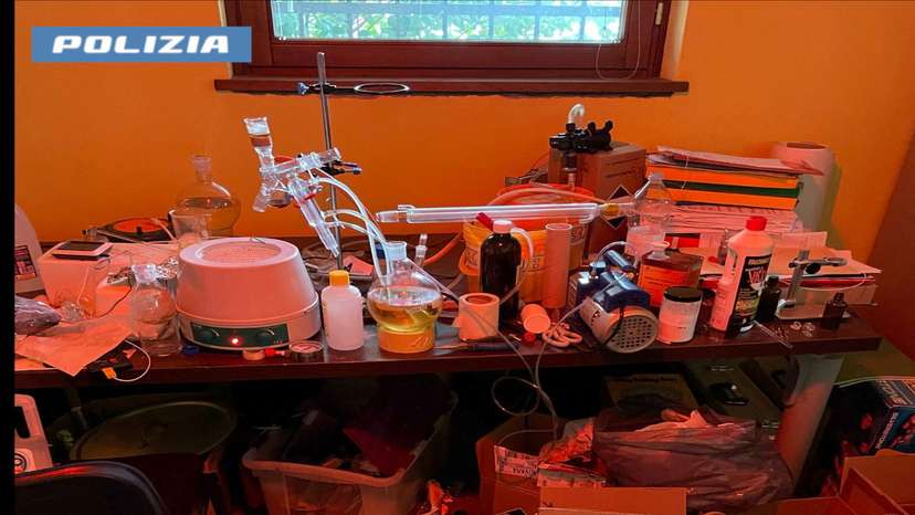 A screen grab from a video shows a general view of a clandestine drug laboratory uncovered by the Novara State Police, in Novara