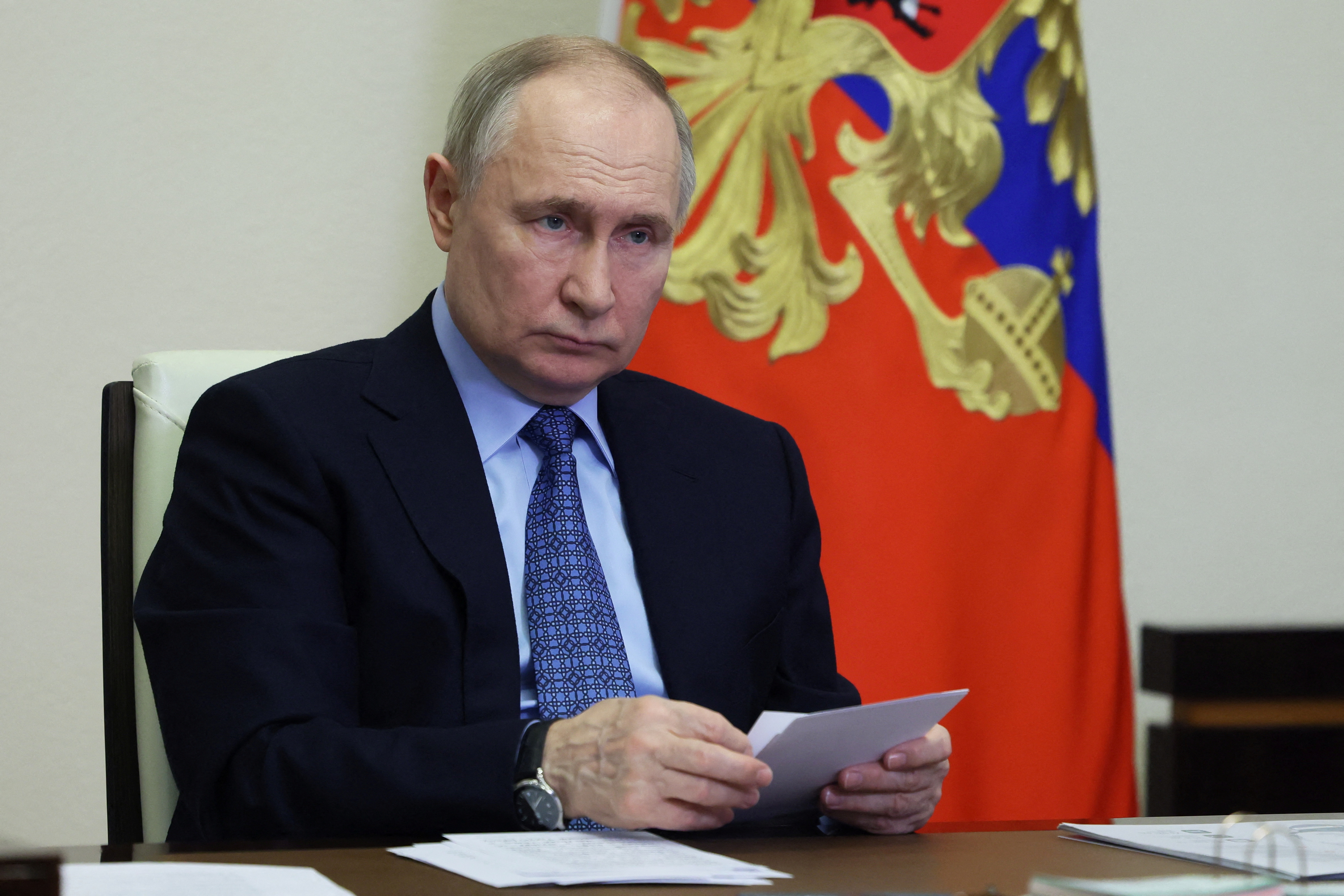 FILE PHOTO: Russian President Putin chairs a meeting via video link at a residence outside Moscow