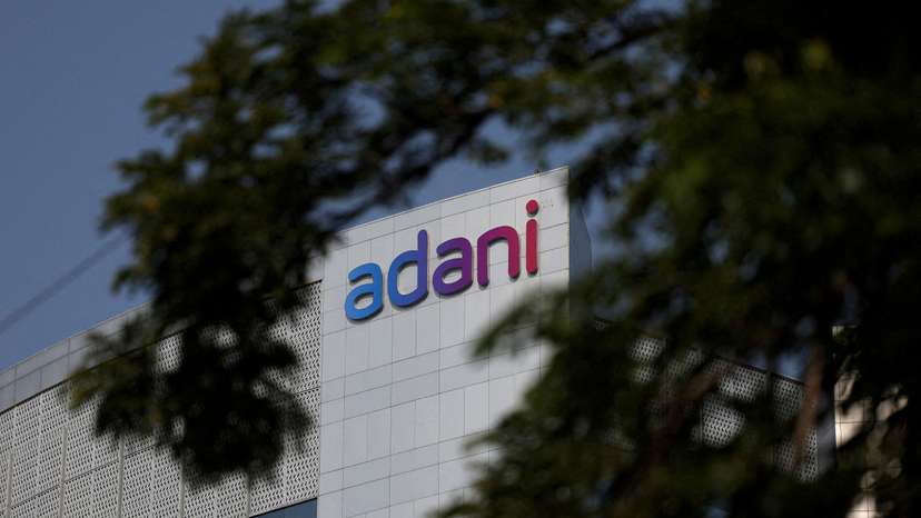 FILE PHOTO: The logo of the Adani Group is seen on the facade of its Corporate House on the outskirts of Ahmedabad