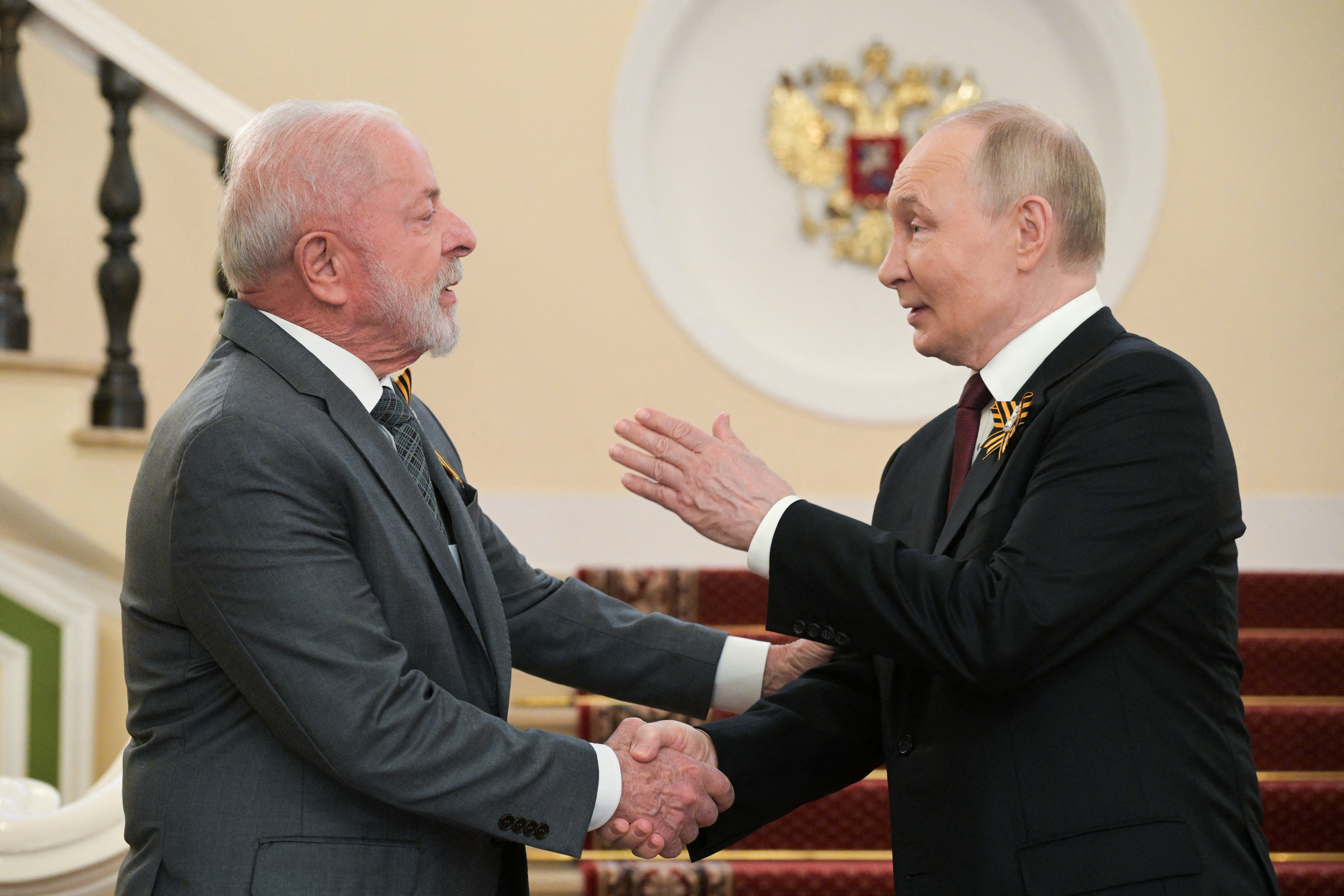 FILE PHOTO: Russian President Putin greets foreign leaders before parade marking WW2 victory anniversary in Moscow