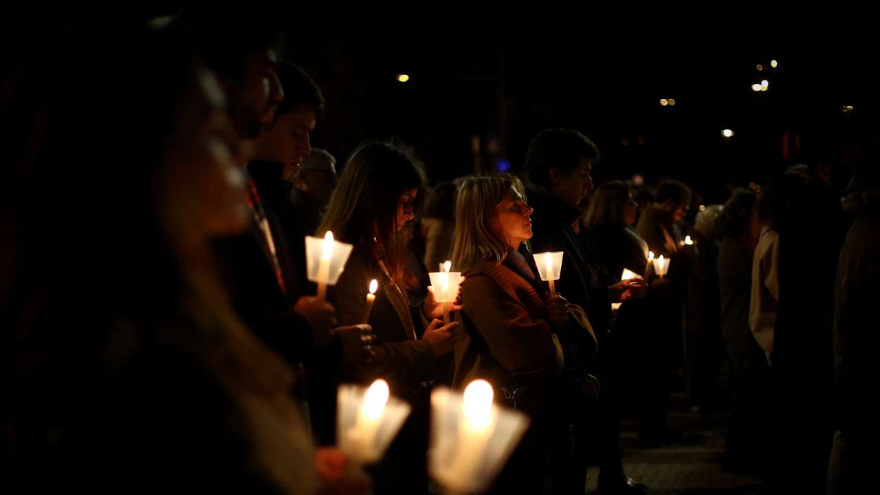 FILE PHOTO: People participate in a vigil in support of the 4,815 children that were sexually abused by members of the Portuguese Catholic Church, according to the commission investigating the issue, in Lisbon