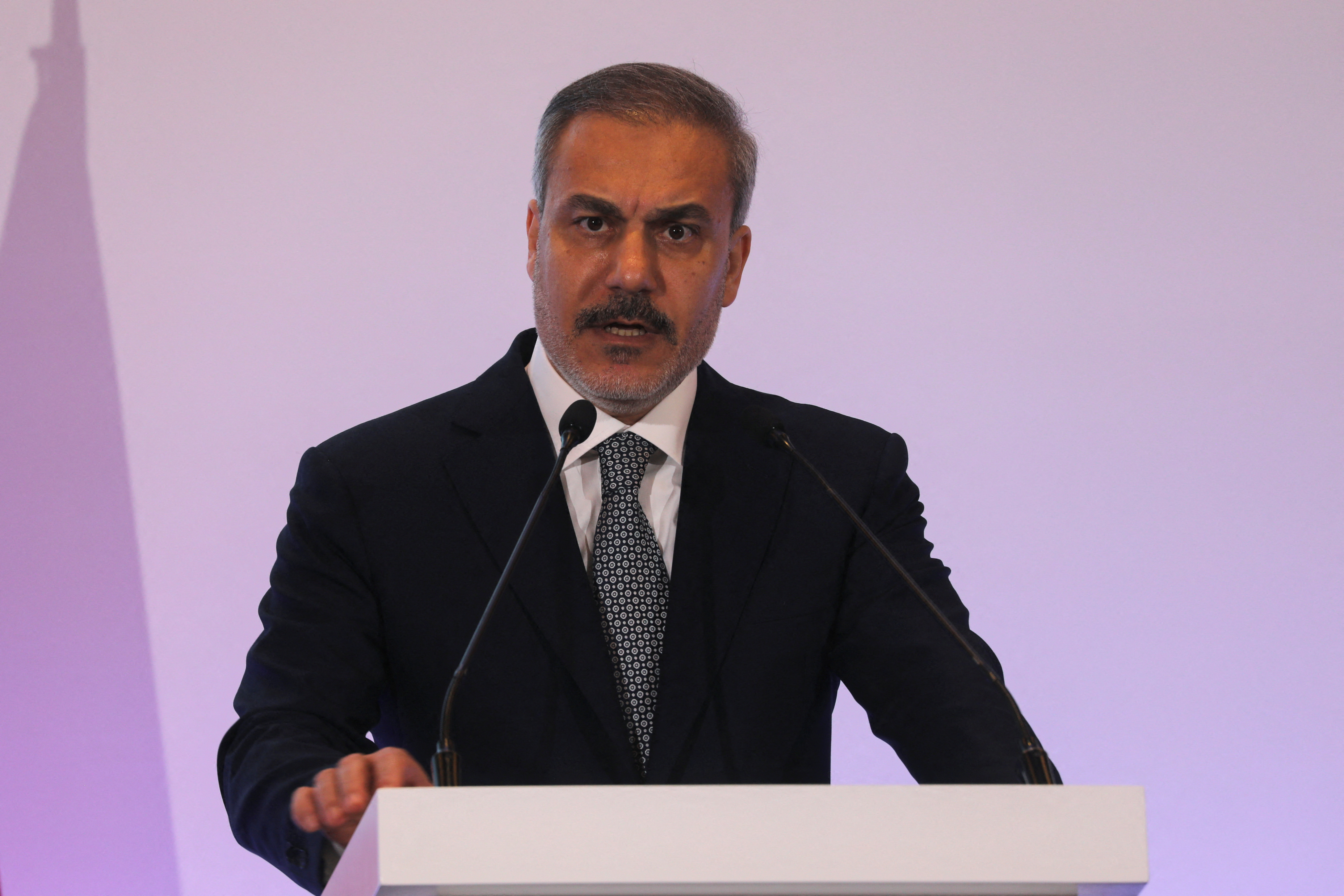 Turkish Foreign Minister Hakan Fidan speaks to the media during Doha Forum in Doha