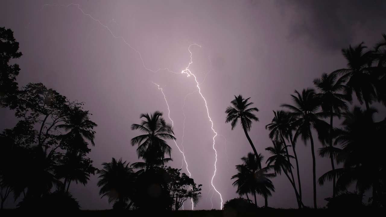 Lightning strikes over Lake Maracaibo in the village of Ologa, where the Catatumbo River feeds into the lake, in the western state of Zulia October 23, 2014. This year the Catatumbo Lightning was approved for inclusion in the 2015 edition of Guinness World Records, dethroning the Congolese town of Kifuka as the place with the world's most lightning bolts per square kilometer each year at 250. Scientists think the Catatumbo, named for a river that runs into the lake, is normal lightning that just happens to occur far more than anywhere else, due to local topography and wind patterns. Picture taken with long exposure October 23, 2014. REUTERS/Jorge Silva (VENEZUELA - Tags: SOCIETY ENVIRONMENT TPX IMAGES OF THE DAY)
ATTENTION EDITORS: PICTURE 10 OF 20 FOR WIDER IMAGE PACKAGE 'VENEZUELA'S ETERNAL STORM'
TO FIND ALL IMAGES SEARCH 'CATATUMBO LIGHTNING'