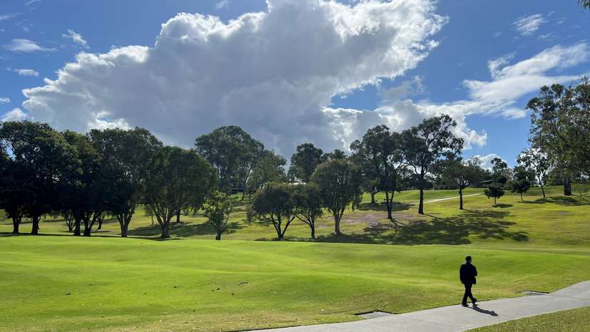 FILE PHOTO: A man walks at the Victoria Park-Barrambin, in Brisbane