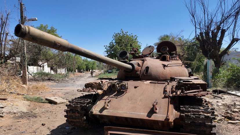 A destroyed tank is seenat a residential neighborhood in the state of Khartoum
