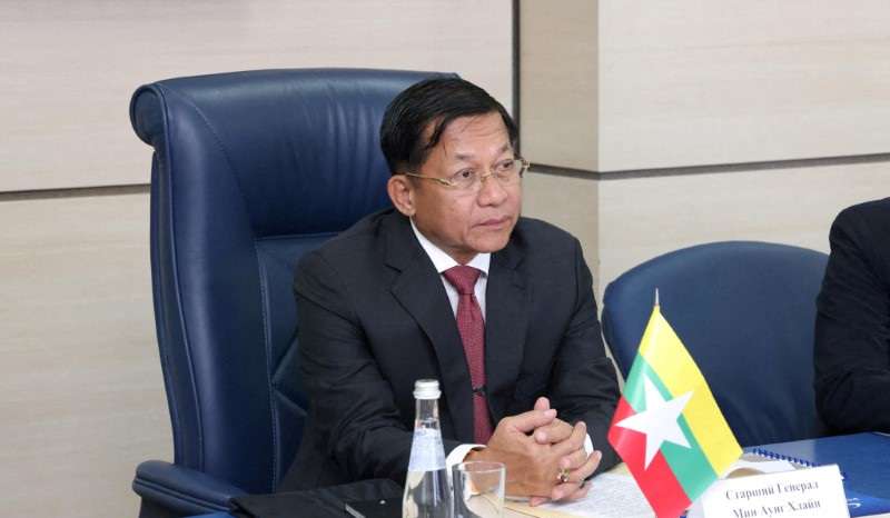 FILE PHOTO: Myanmar's Prime Minister and State Administrative Council Chairman Min Aung Hlaing attends a meeting with Director General of Roscosmos Dmitry Rogozin in Moscow