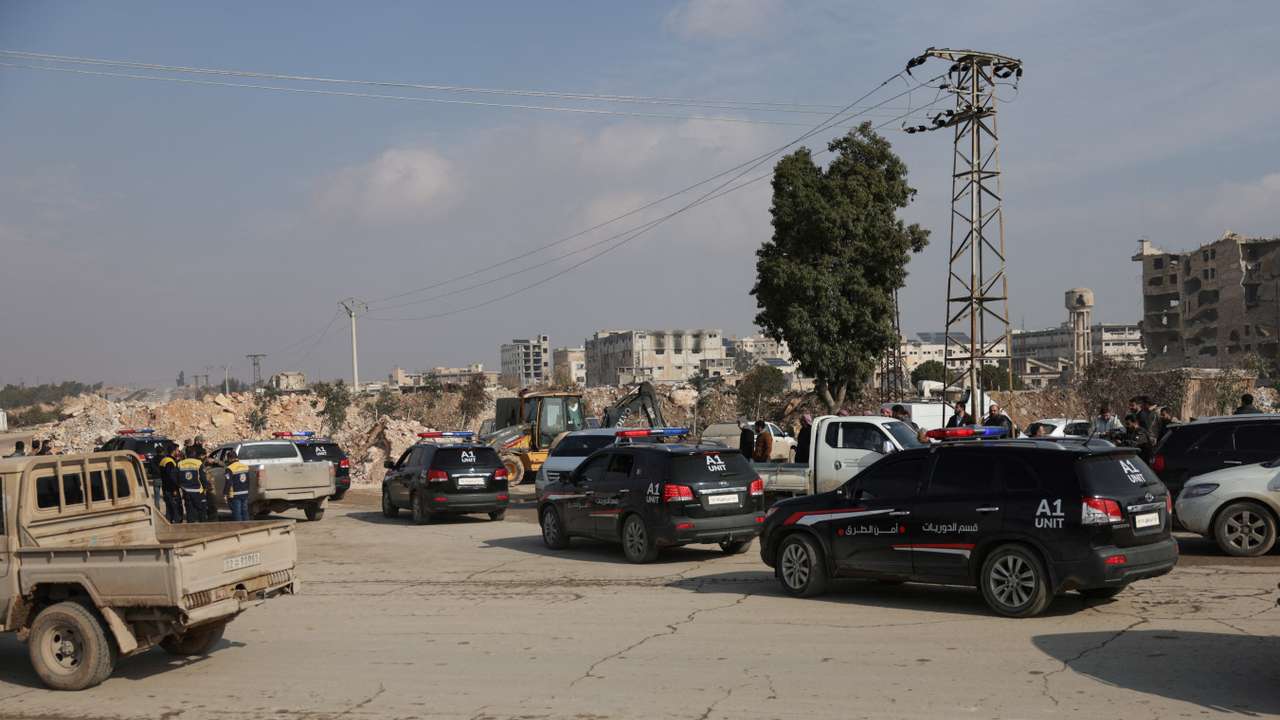 Syrian Democratic Forces (SDF) depart on buses, following an agreement with the Syrian government, in Aleppo