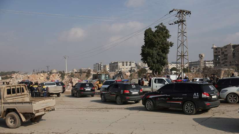 Syrian Democratic Forces (SDF) depart on buses, following an agreement with the Syrian government, in Aleppo