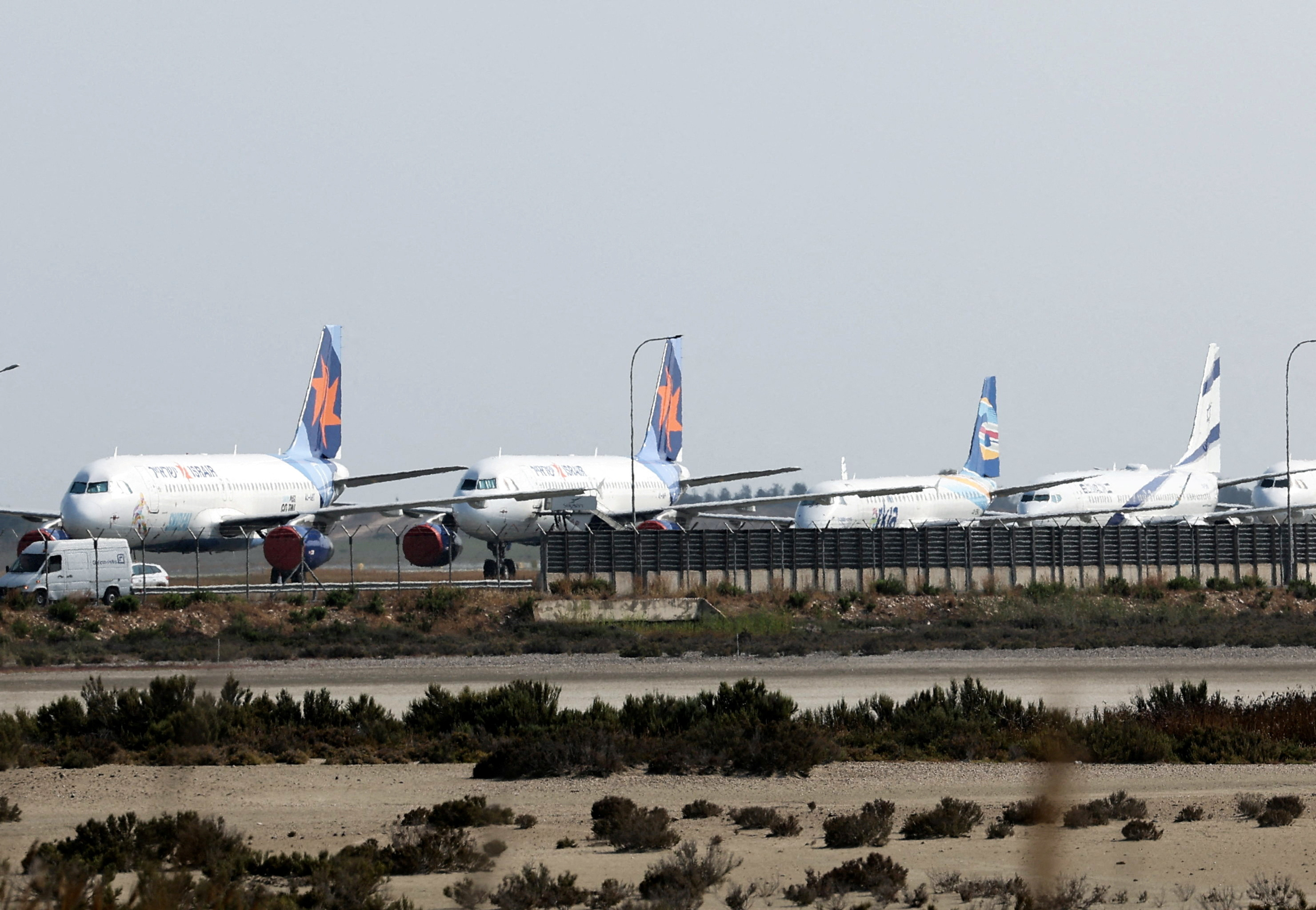 FILE PHOTO: Aircraft belonging to Israel's state carrier El Al and Israir among other airlines, are parked at Larnaca International Airport, in Larnaca