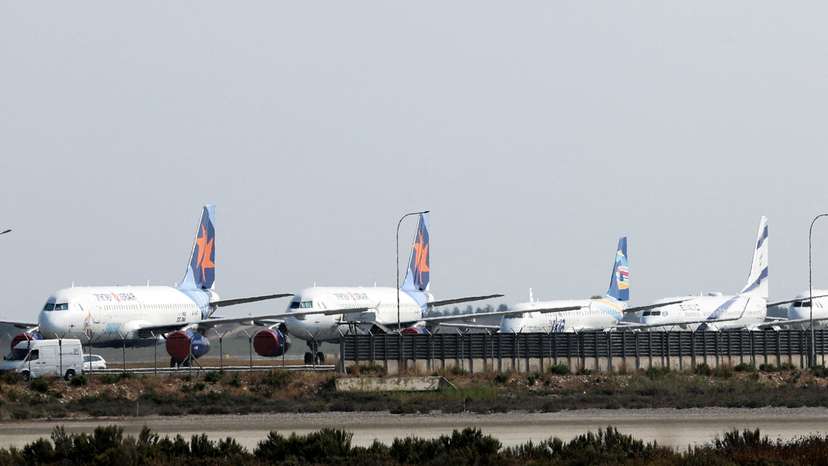 FILE PHOTO: Aircraft belonging to Israel's state carrier El Al and Israir among other airlines, are parked at Larnaca International Airport, in Larnaca