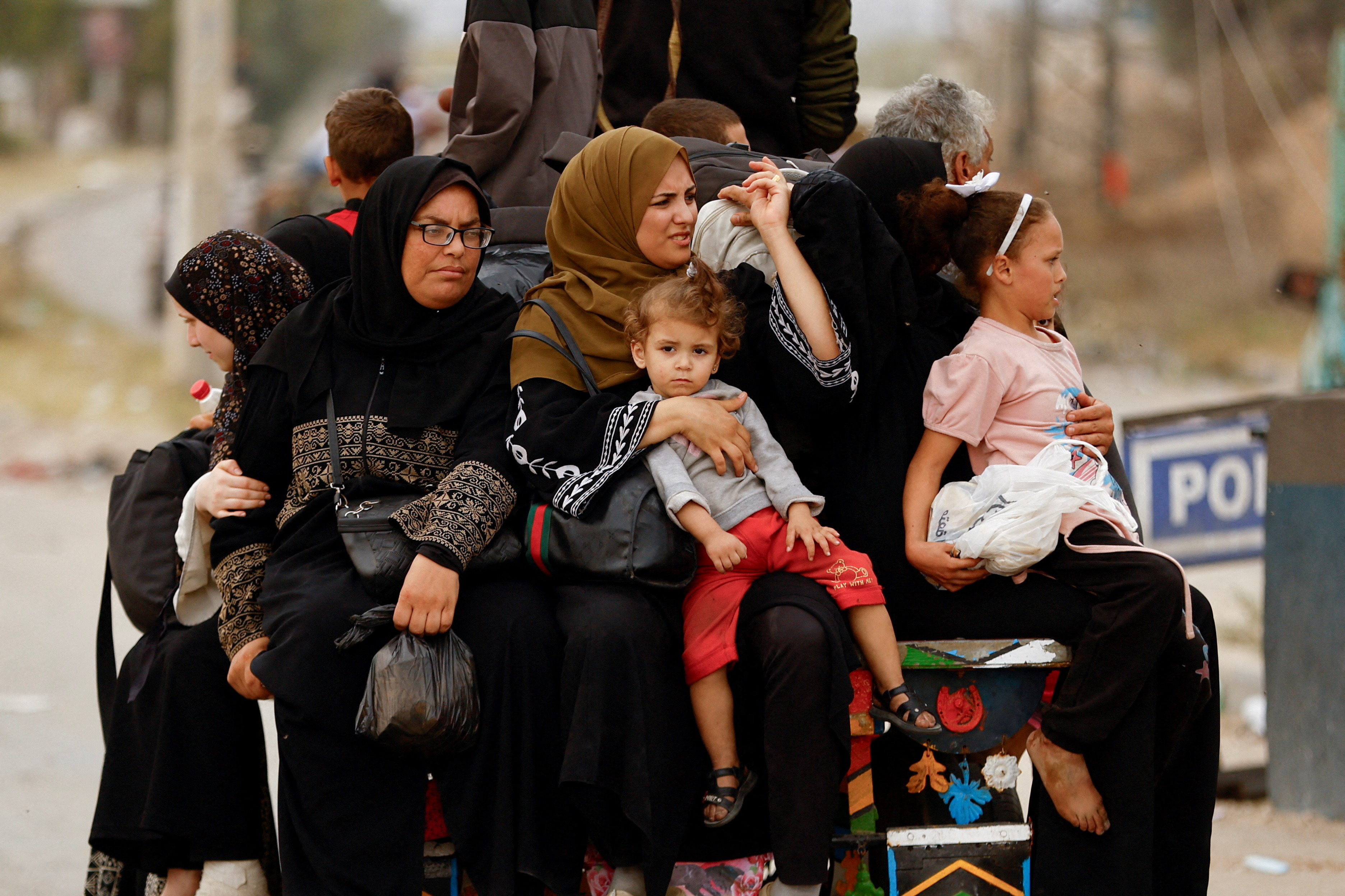 Palestinians fleeing north Gaza move southward, in the central Gaza Strip