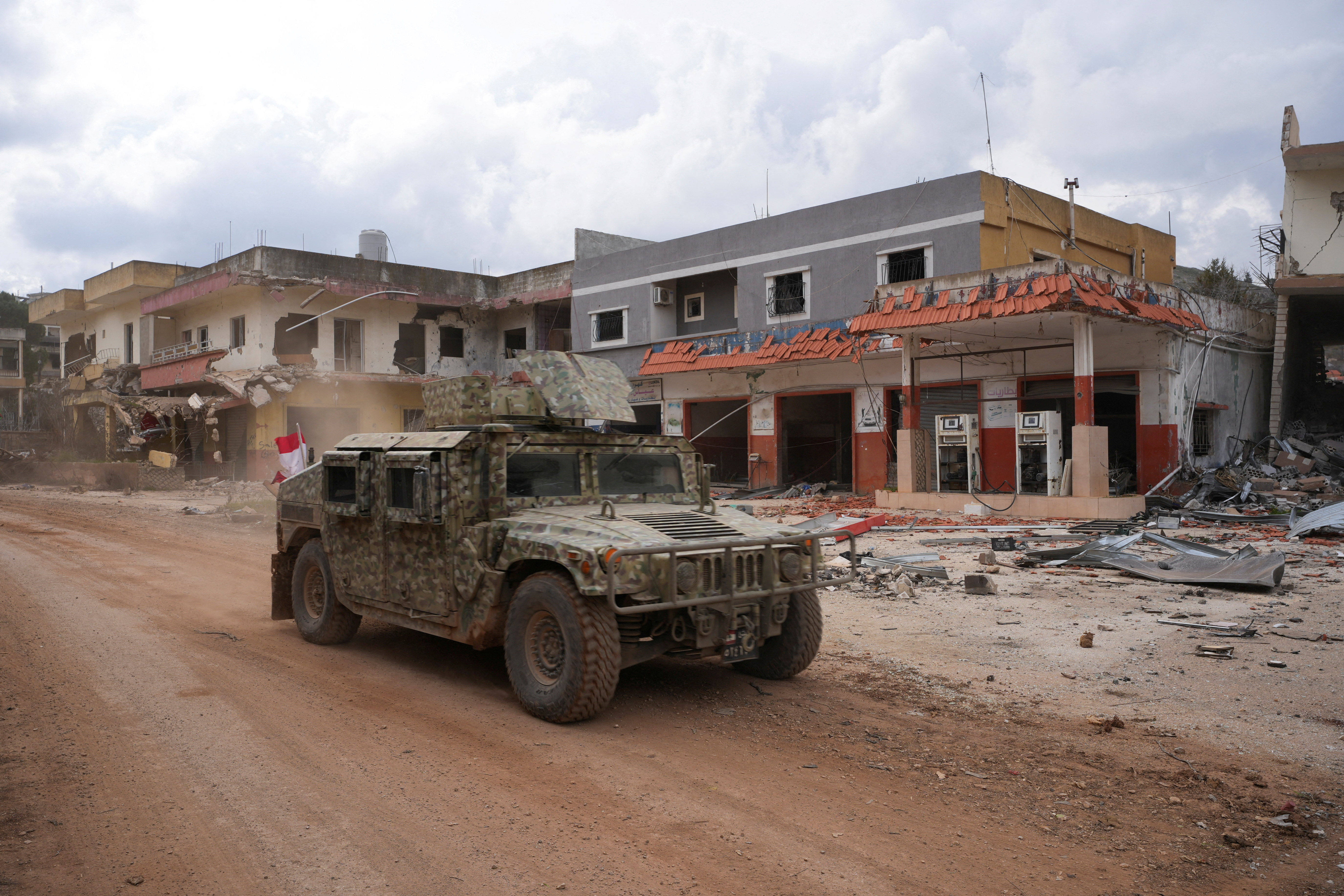 FILE PHOTO: A Lebanese military vehicle drives, after Israeli troops withdrew from most of south Lebanon, in Mays al-Jabal