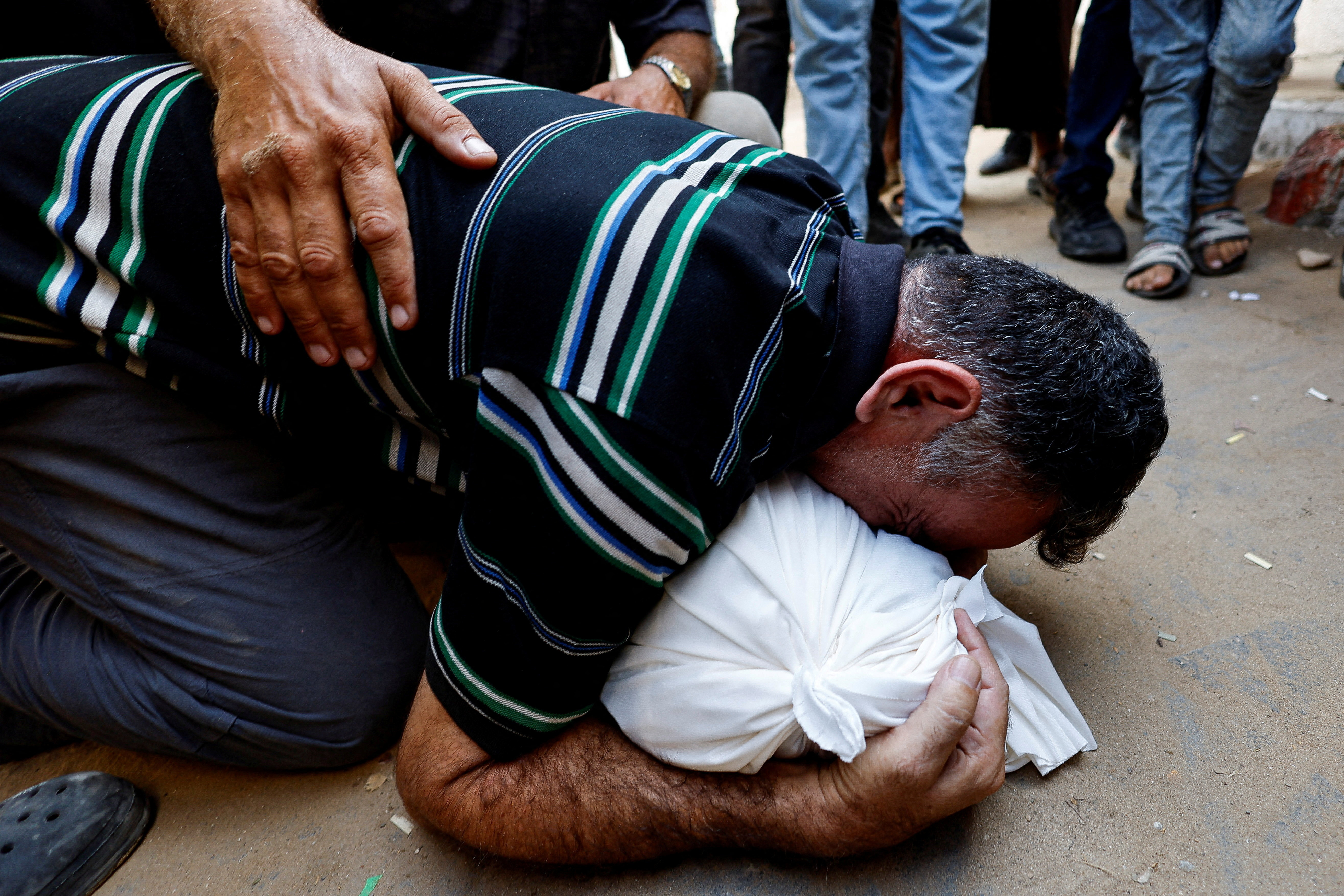 Palestinians mourn loved ones killed in Israeli strikes in Gaza City