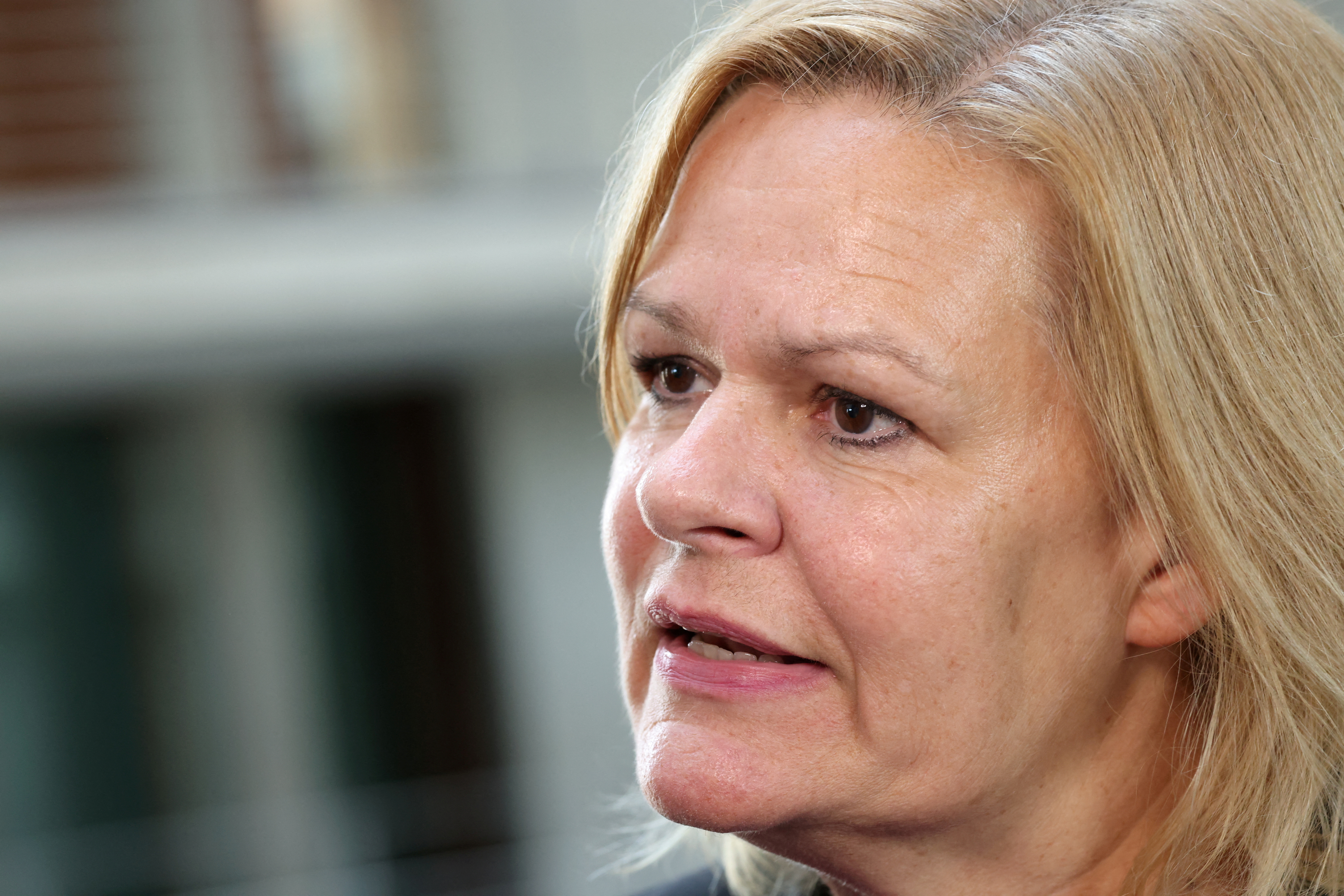 FILE PHOTO: German Interior Minister Nancy Faeser addresses members of the media, in Berlin