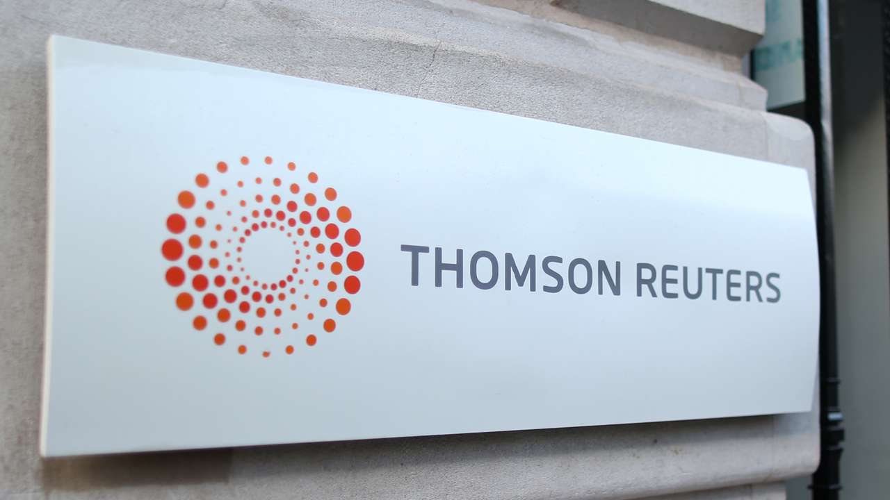 The logo of Thomson Reuters is pictured at the entrance of its Paris headquarters, France