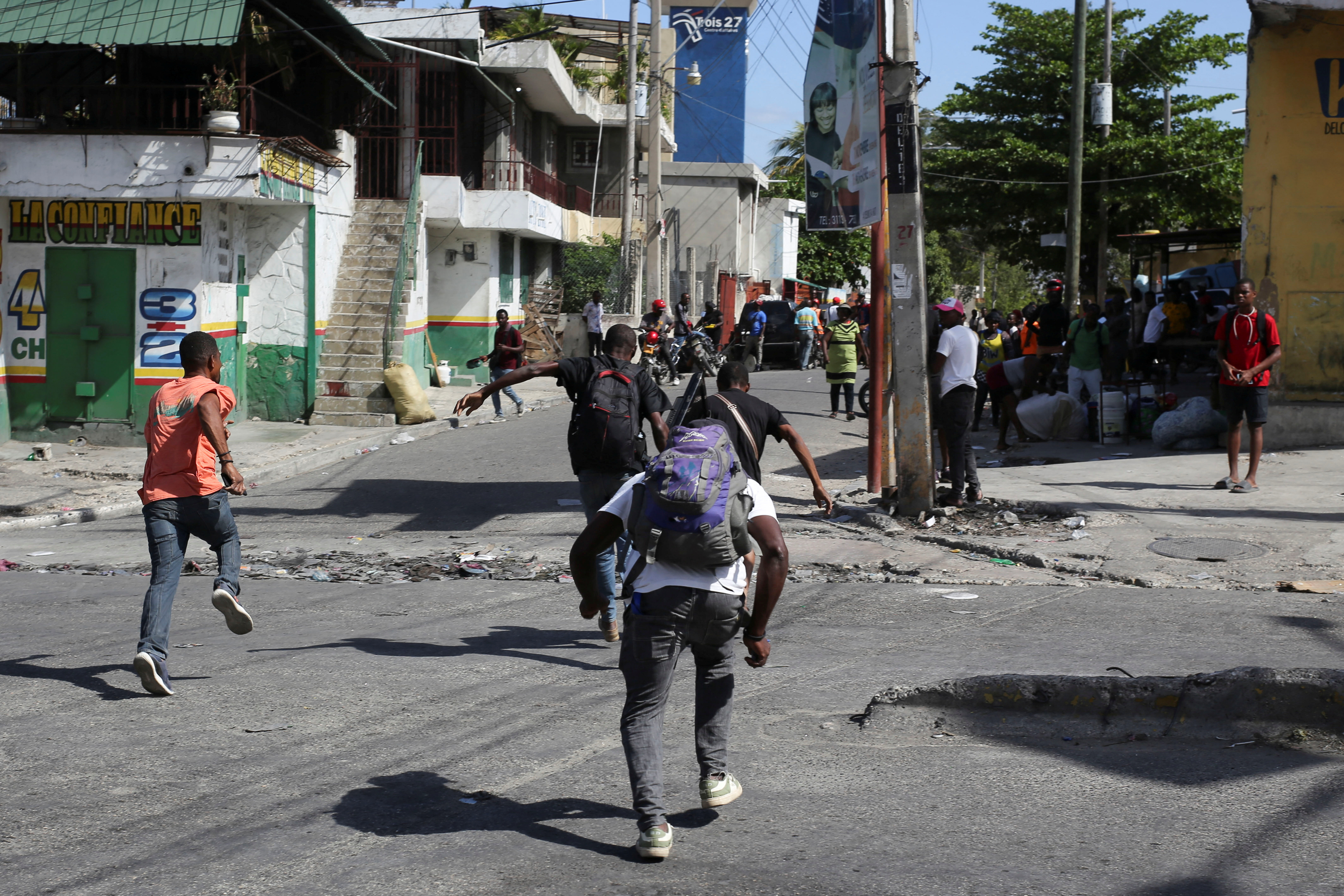 Residents flee their neighbourhood due to gang violence, in Port-au-Prince