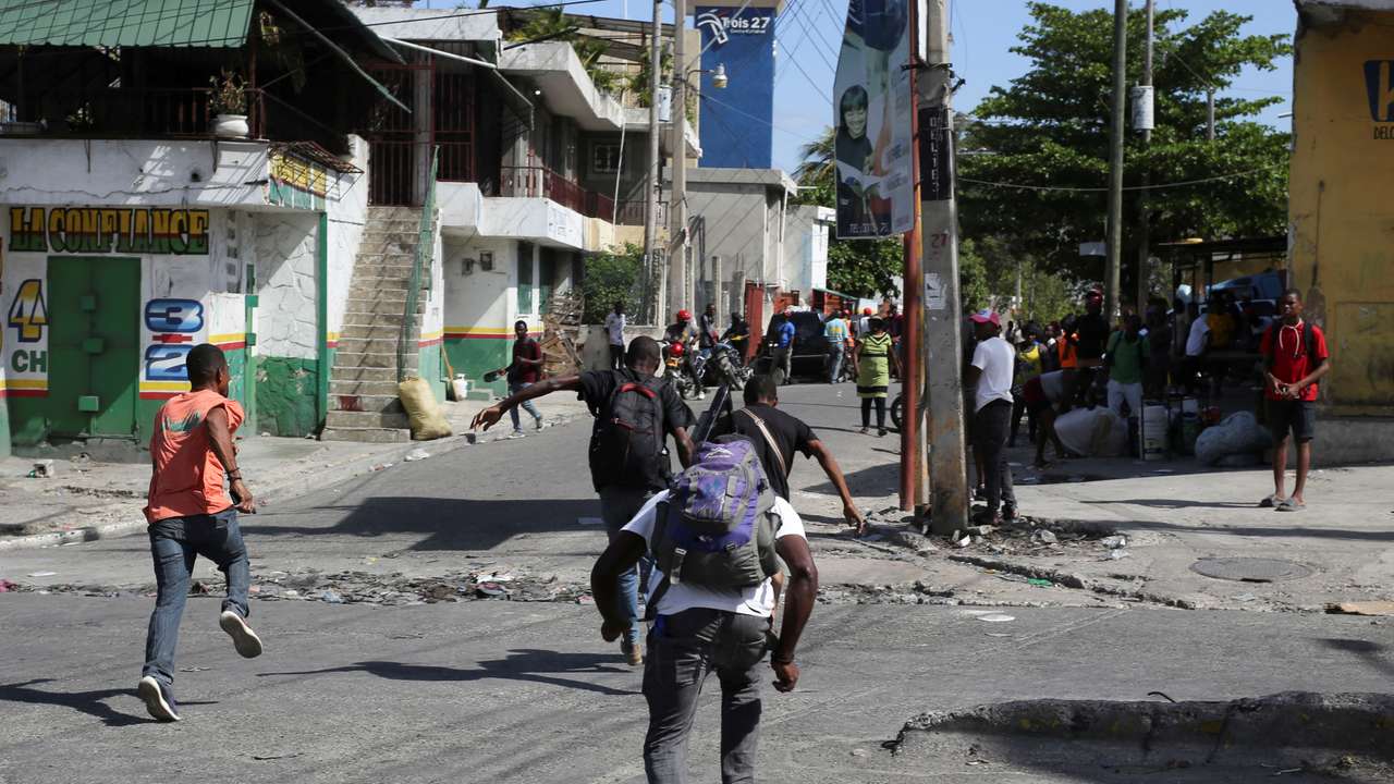 Residents flee their neighbourhood due to gang violence, in Port-au-Prince