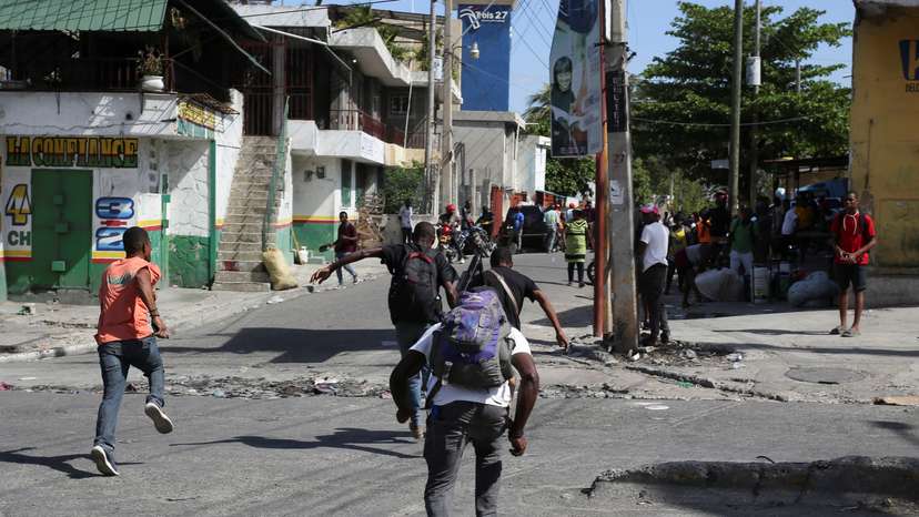 Residents flee their neighbourhood due to gang violence, in Port-au-Prince