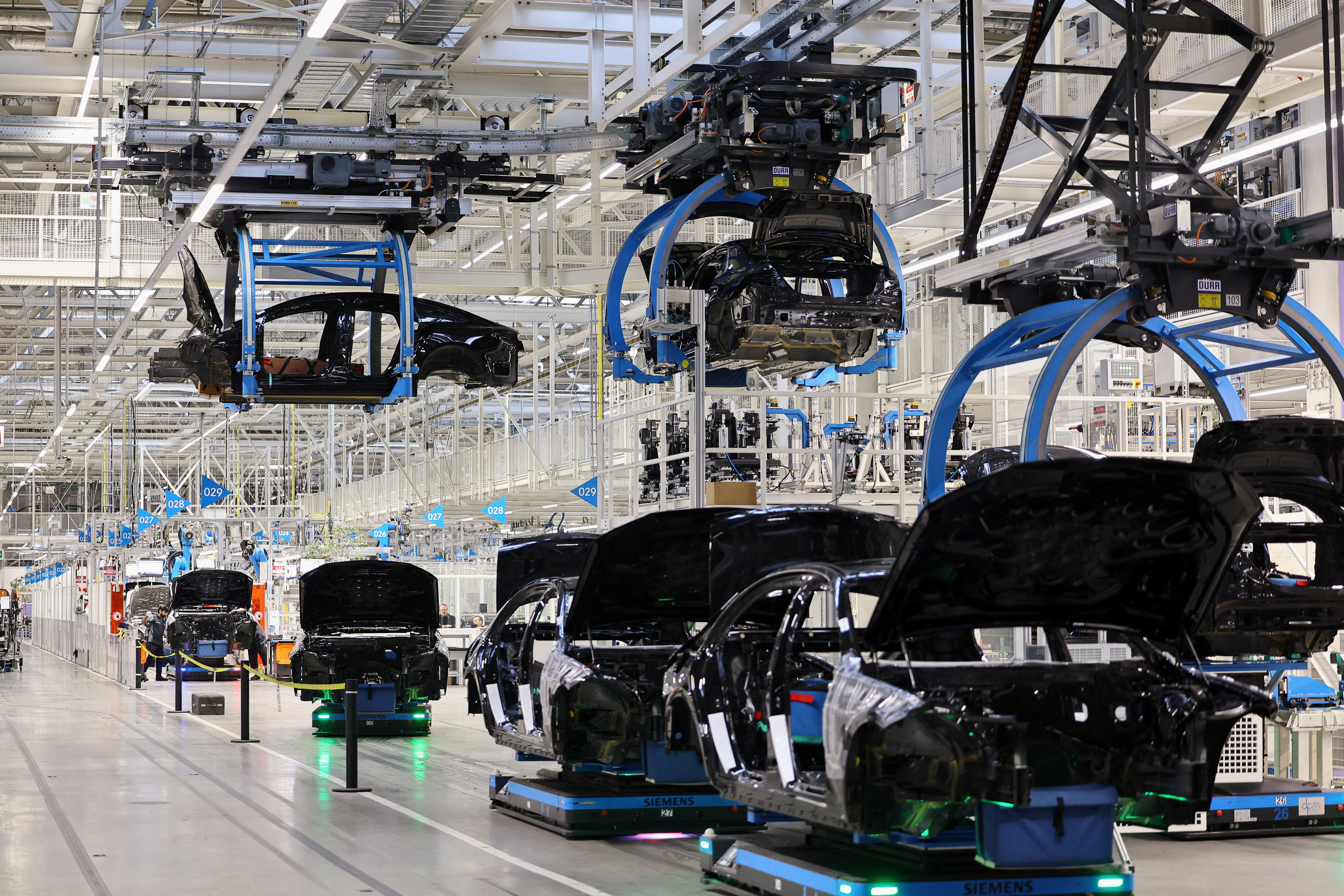 FILE PHOTO: Car bodies are lifted at "Factory 56" in Sindelfingen