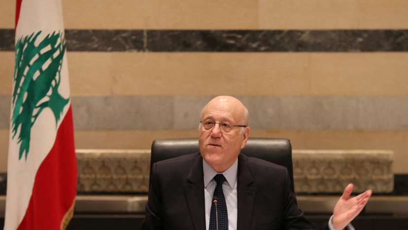FILE PHOTO: Lebanon's caretaker Prime Minister Najib Mikati heads a cabinet meeting in Beirut