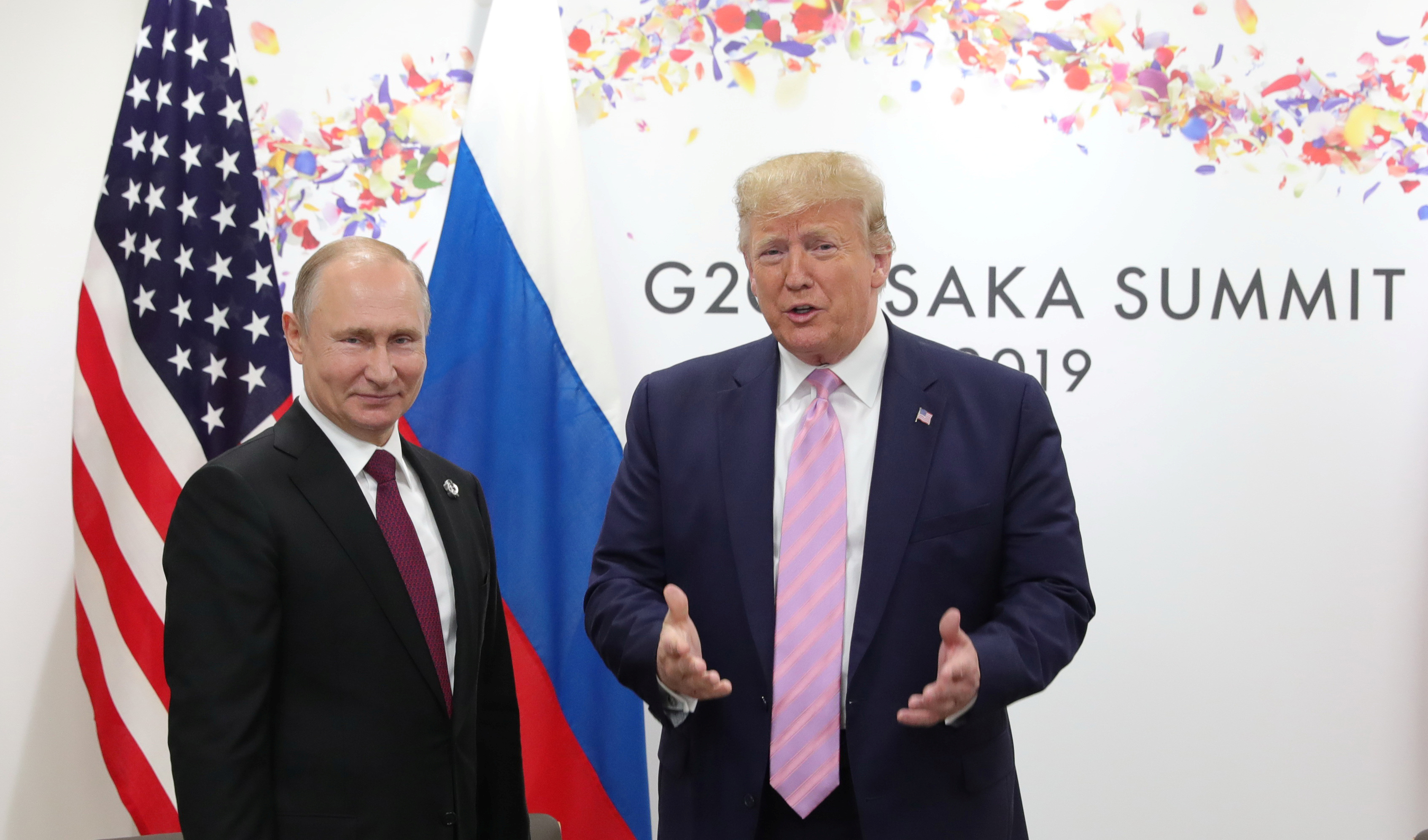Russia's President Vladimir Putin and U.S. President Donald Trump attend a meeting on the sidelines of the G20 summit in Osaka