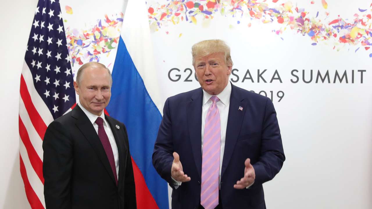 Russia's President Vladimir Putin and U.S. President Donald Trump attend a meeting on the sidelines of the G20 summit in Osaka