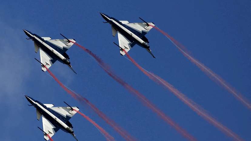 FILE PHOTO: China's J-10 fighter jets from the People's Liberation Army Air Force August 1st Aerobatics Team are seen in a 2015 media demonstration in Thailand