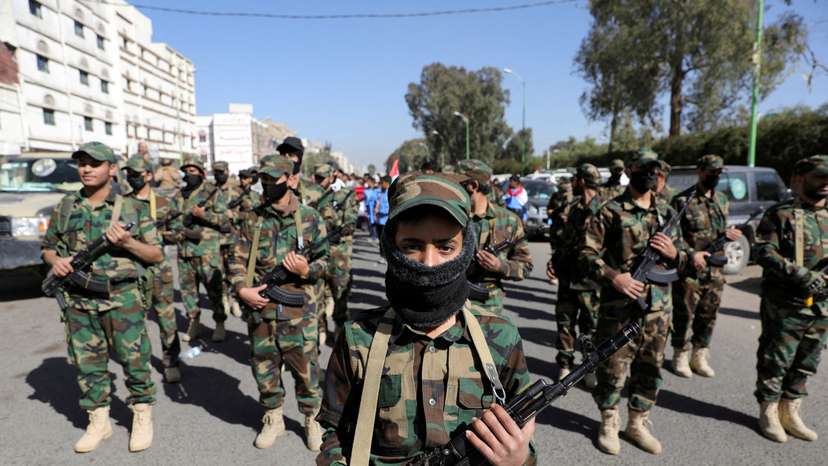 FILE PHOTO: Houthi mobilization trainees parade in Sanaa