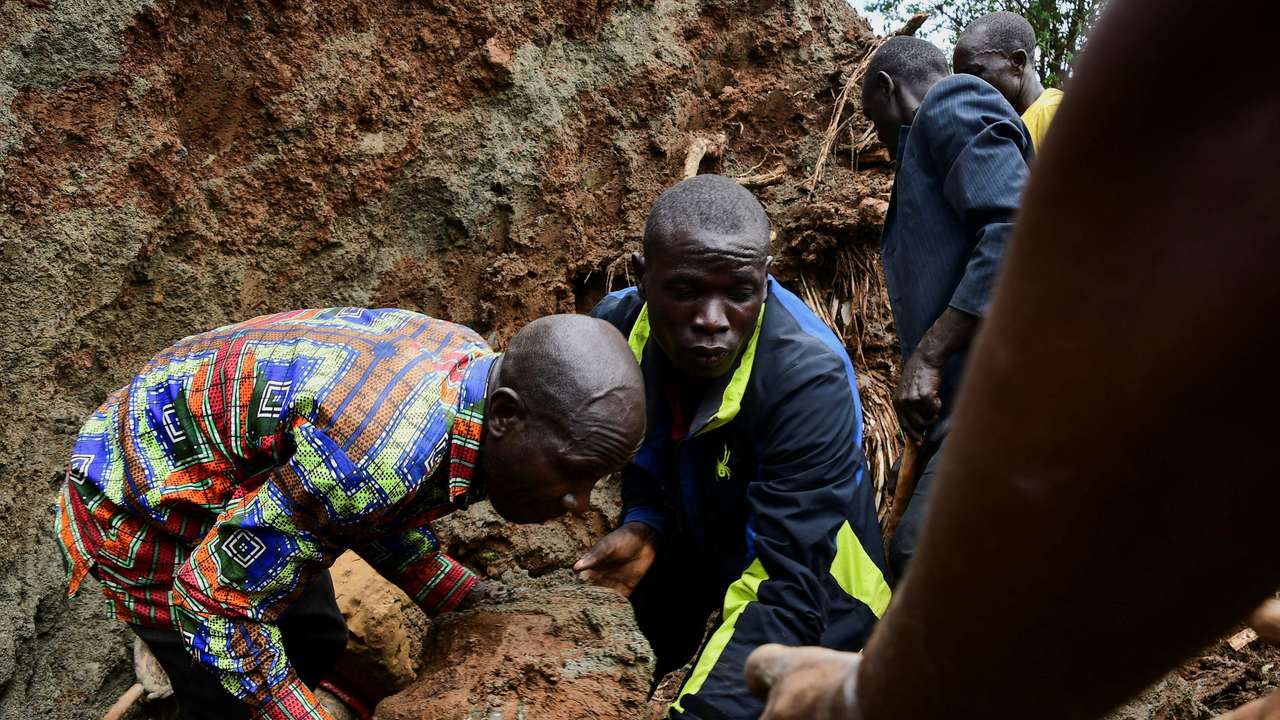 Ugandan villagers search for those buried by deadly mudslide
