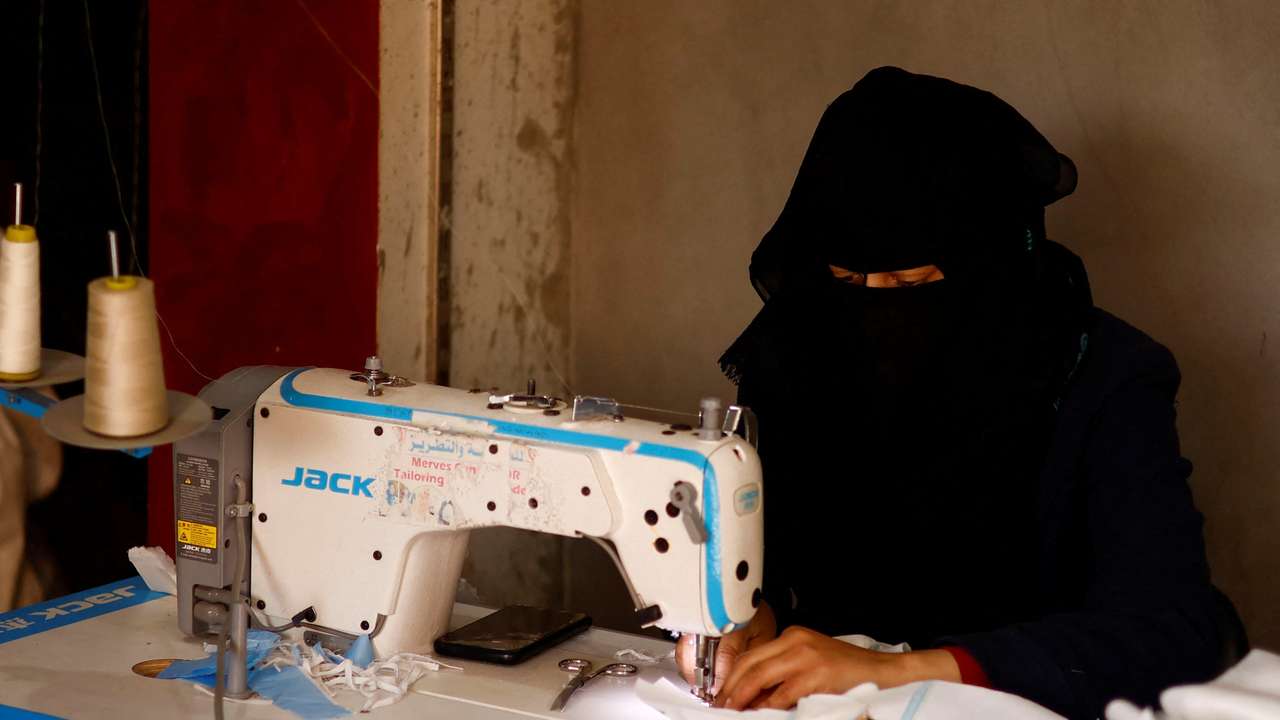Palestinians sew diapers in a workshop amid scarcity as the conflict between Israel and Hamas continues, in Rafah