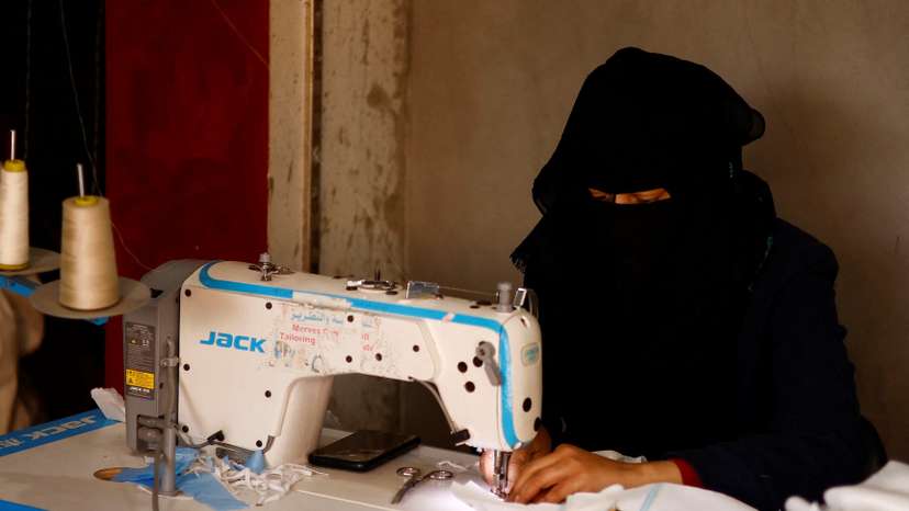 Palestinians sew diapers in a workshop amid scarcity as the conflict between Israel and Hamas continues, in Rafah