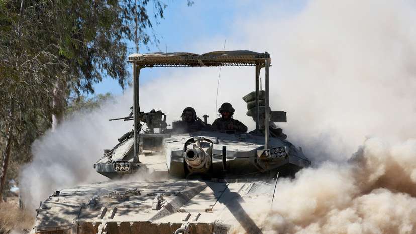 FILE PHOTO: Israeli tank manoeuvres near the Israel-Gaza border